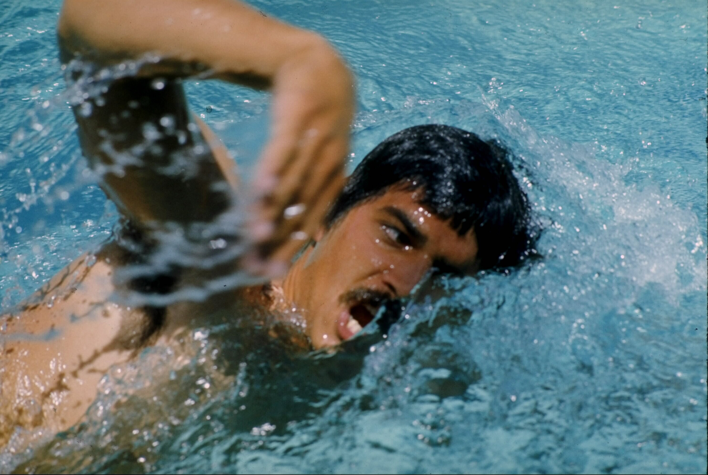 1972: Mark Spitz of the USA in action at the 1972 Olympics Games in Munich, Germany. Spitz achieved medal winning fame at these Munich Games where he won seven golds, the highest any Olympic Competitor has won for any sport at single Games. He took both