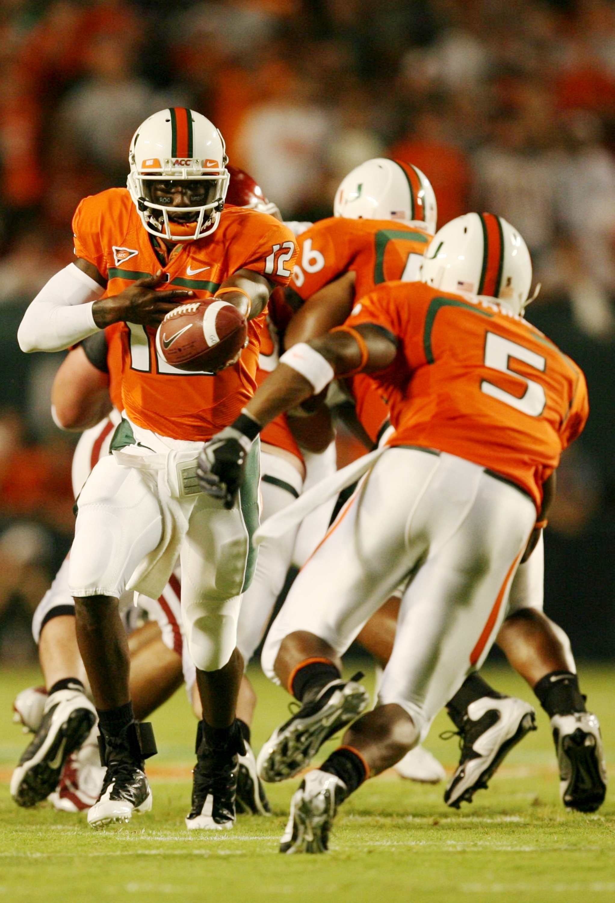 MIAMI GARDENS, FL - OCTOBER 3: Quarterback Jacory Harris #12 of the Miami Hurricanes looks to pass the ball against the Oklahoma Sooners in the second quarter of the game on October 3, 2009 at Landshark Stadium in Miami Gardens, Florida. (Photo by Doug B