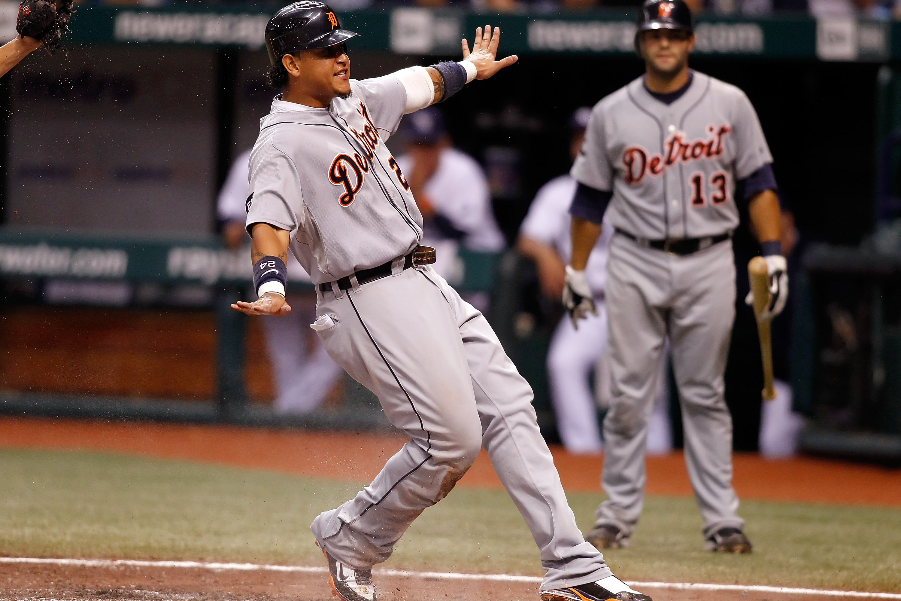 Detroit Tigers' Placido Polanco, right, is congratulated by Miguel Cabrera  after scoring in the third inning of a baseball game against the Kansas  City Royals, Saturday, Aug. 30, 2008, in Detroit. (AP