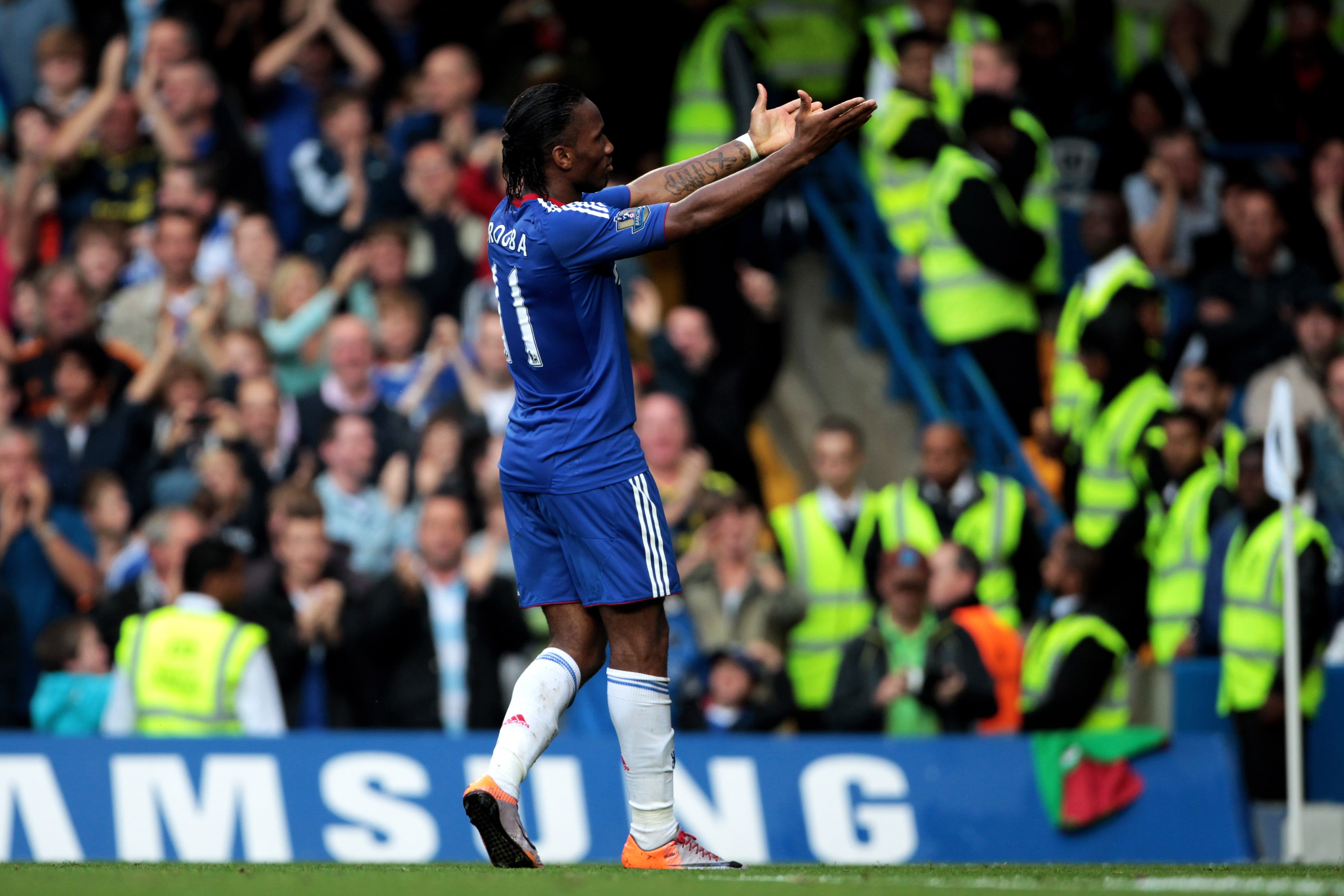 LONDON, ENGLAND - AUGUST 14:  Didier Drogba #11 celebrates after scoring his team's second goal during the Barclays Premier League match between Chelsea and West Bromwich Albion at Stamford Bridge on August 14, 2010 in London, England.  (Photo by Phil Col