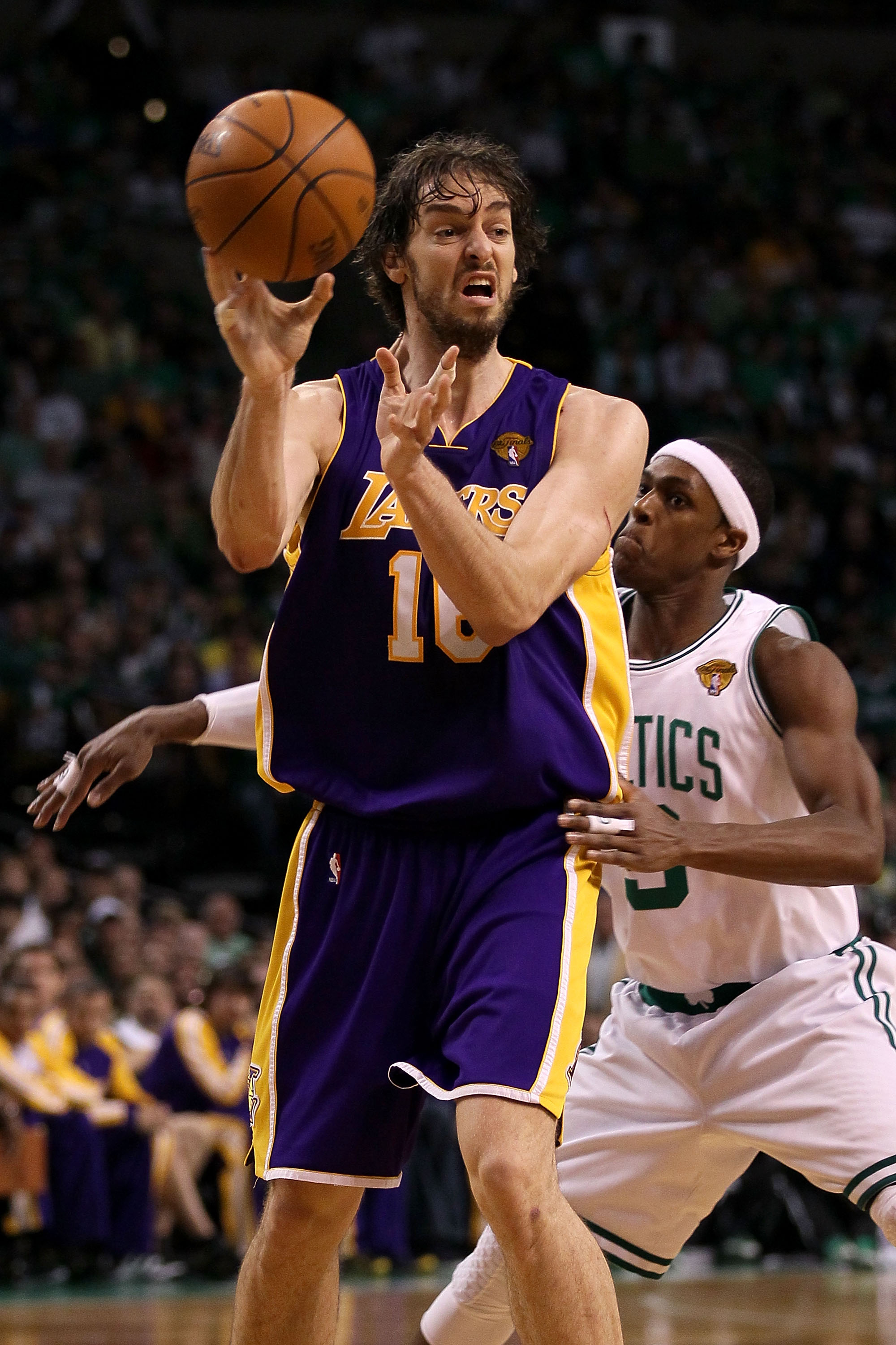BOSTON - JUNE 13:  Pau Gasol #16 of the Los Angeles Lakers passes the ball against Rajon Rondo #9 of the Boston Celtics during Game Five of the 2010 NBA Finals on June 13, 2010 at TD Garden in Boston, Massachusetts. The Celtics won 92-86.  NOTE TO USER: U