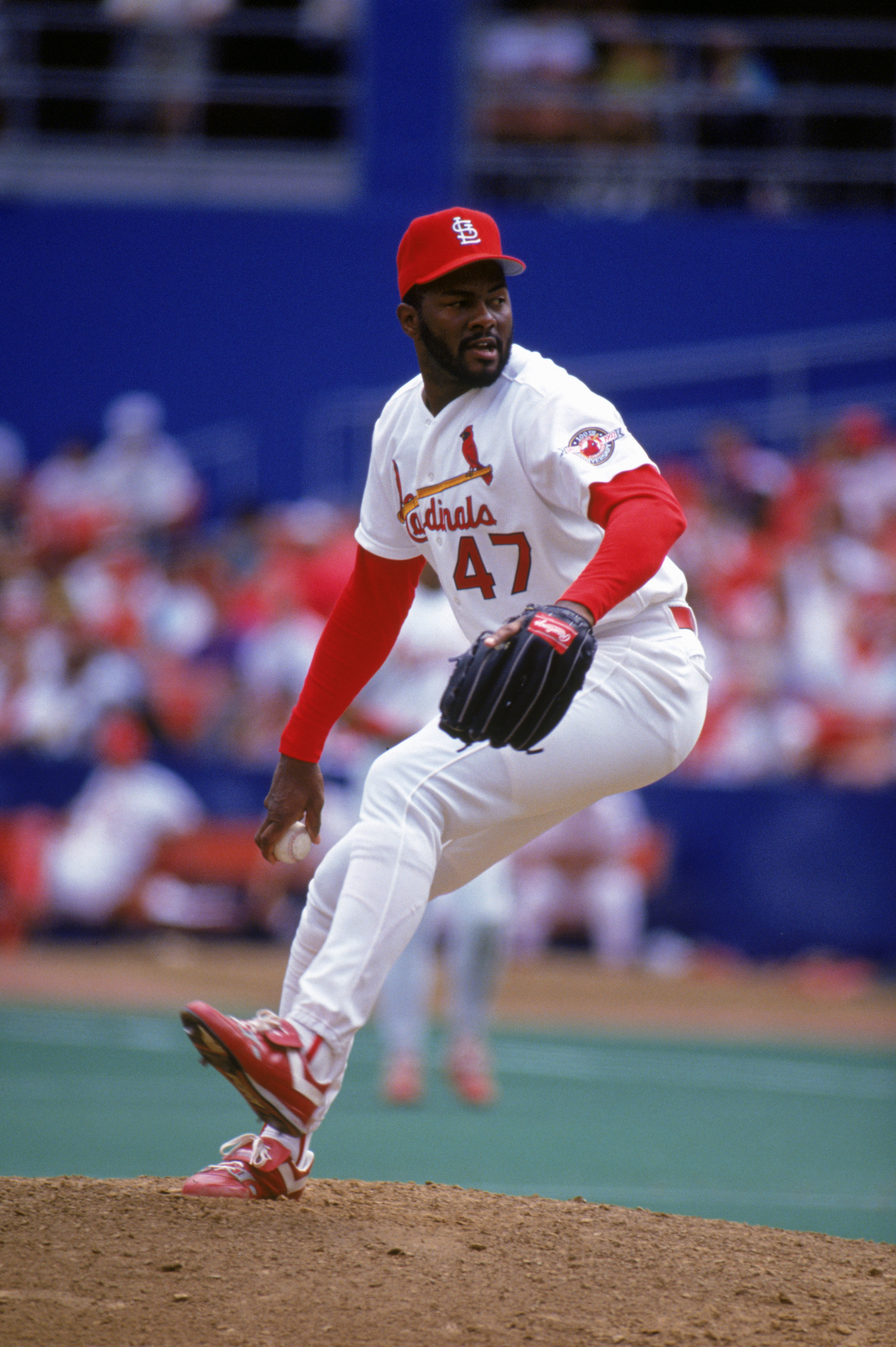 ST. LOUIS - AUGUST:  Lee Smith #47 of the St. Louis Cardinals pitches during a game in August 1992 at Busch Stadium in St. Louis, Missouri.  (Photo by Jonathan Daniel/Getty Images)