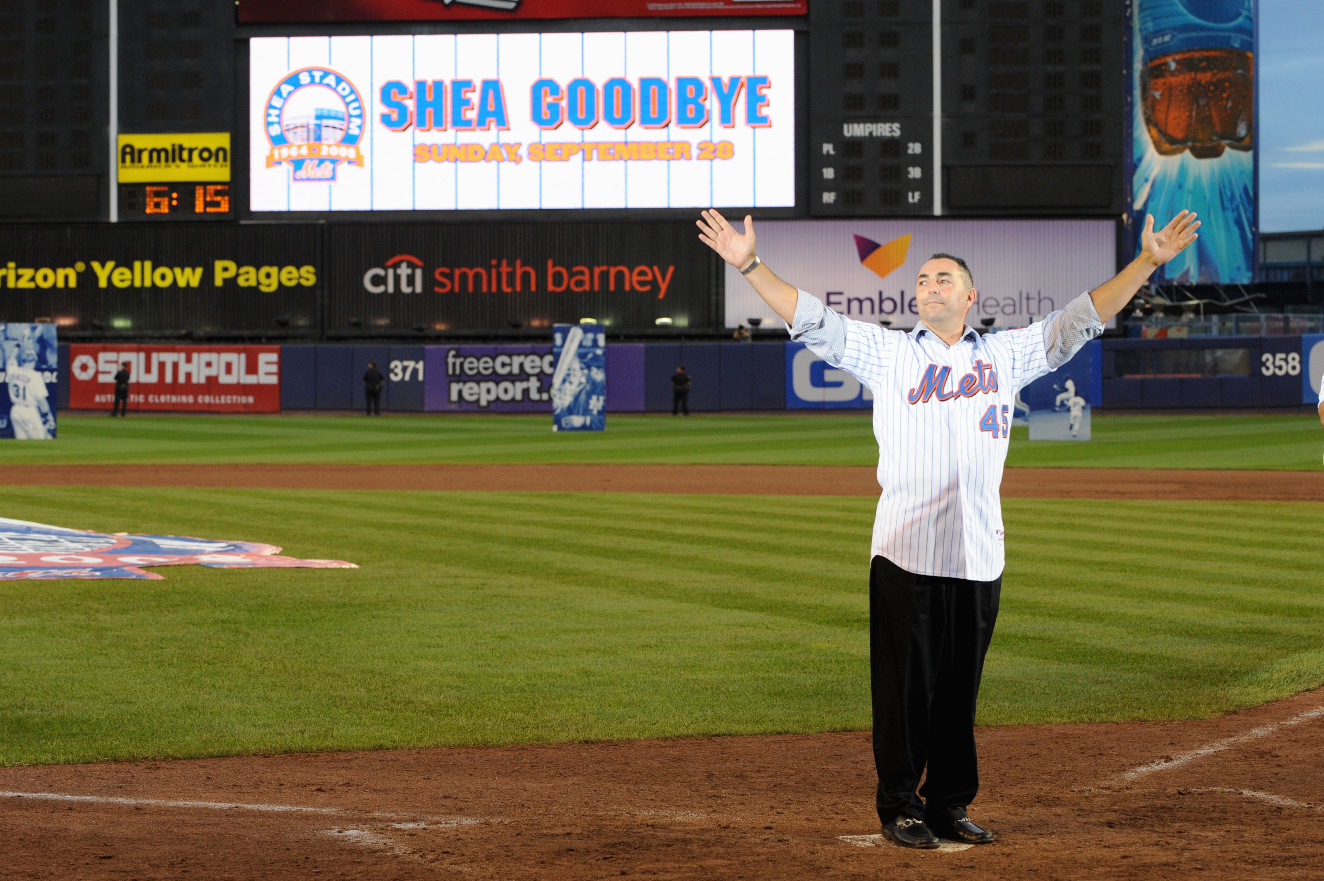 NEW YORK - SEPTEMBER 28:  Former New York Mets players John Franco waves to the fans at home plate after the game against the Florida Marlins to commemorate the last regular season baseball game ever played in Shea Stadium on September 28, 2008 in the Flu