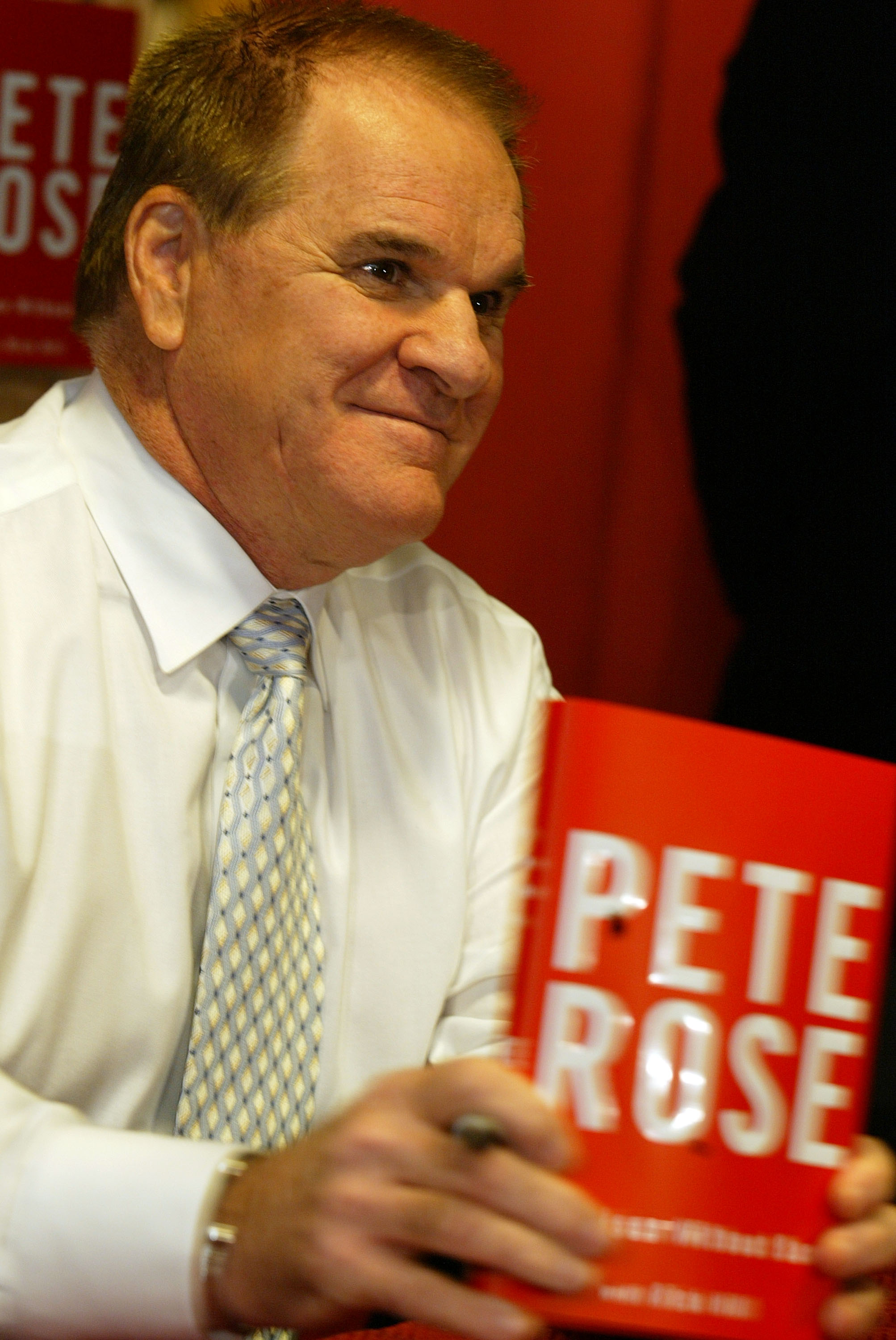NEW YORK - JANUARY 9: Controversial former baseball great Pete Rose attends a signing for his autobiography 'My Prison Without Bars' January 9, 2004 in New York City. In the newly-released book, Rose admitted to gambling on the Cincinnati Reds while he ma