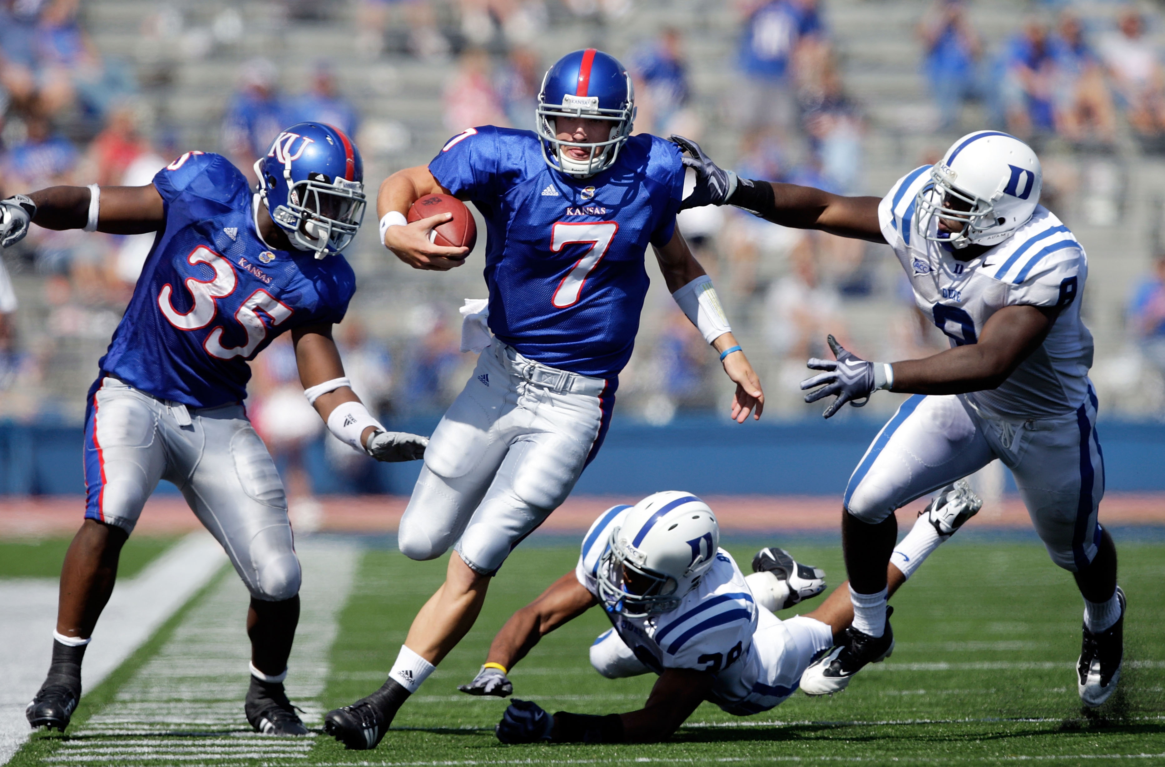 LAWRENCE, KS - SEPTEMBER 19: Quarterback Kale Pick #7 of the Kansas Jayhawks carries the ball upfield during the game against the Duke Blue Devils on Kivisto Field at Memorial Stadium on September 19, 2009 in Lawrence, Kansas. (Photo by Jamie Squire/Ge