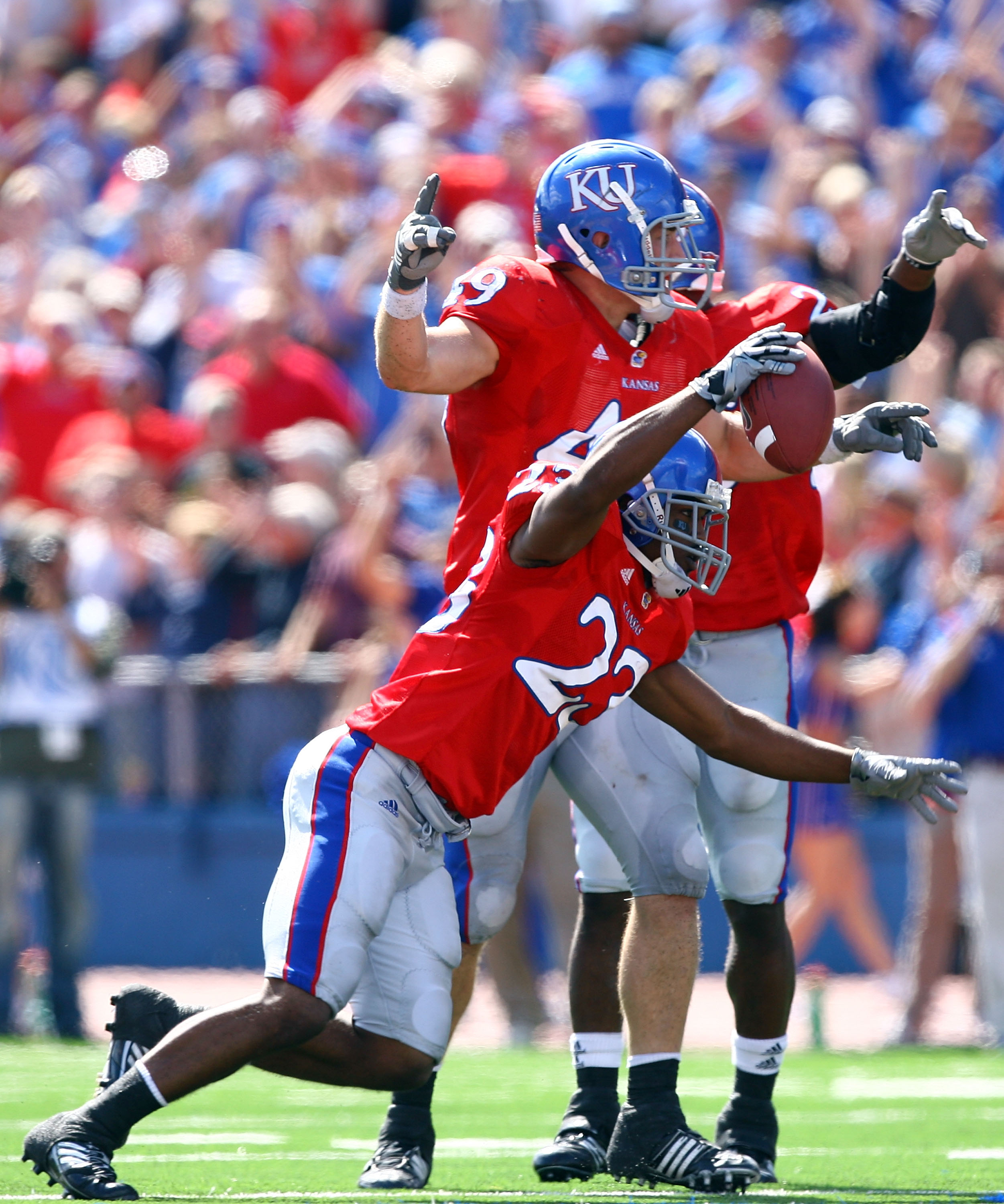 LAWRENCE, KS - SEPTEMBER 26: Ryan Murphy #23 of the Kansas Jayhawks reacts after making an interception during the game against the Southern Mississippi Golden Eagles on September 26, 2009 at Memorial Stadium in Lawrence, Kansas. (Photo by Jamie Squire/