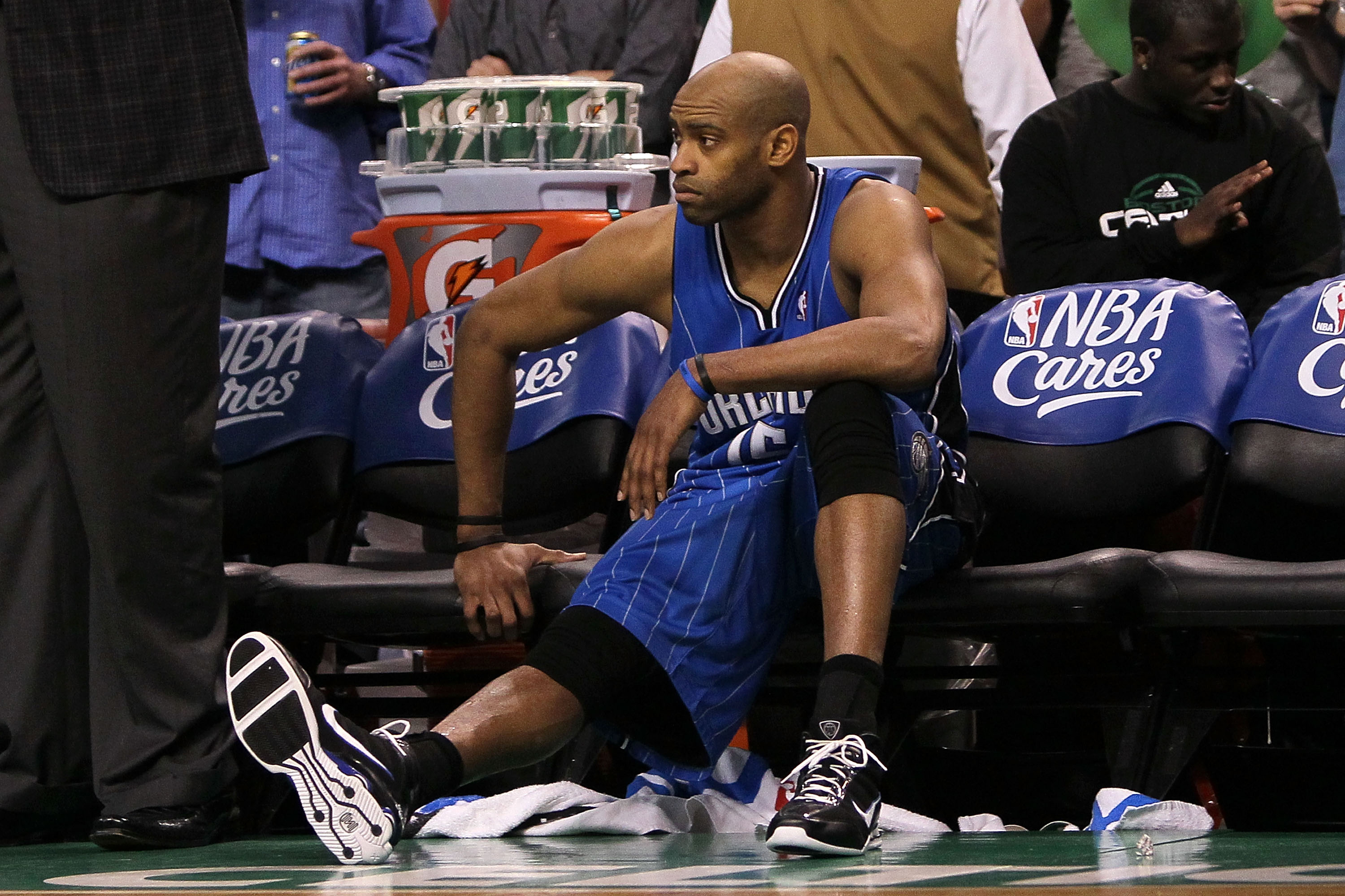 BOSTON - MAY 28:  Vince Carter #15 of the Orlando Magic looks on from the bench dejected after they lost 96-84 against the Boston Celtics in Game Six of the Eastern Conference Finals during the 2010 NBA Playoffs at TD Garden on May 28, 2010 in Boston, Mas