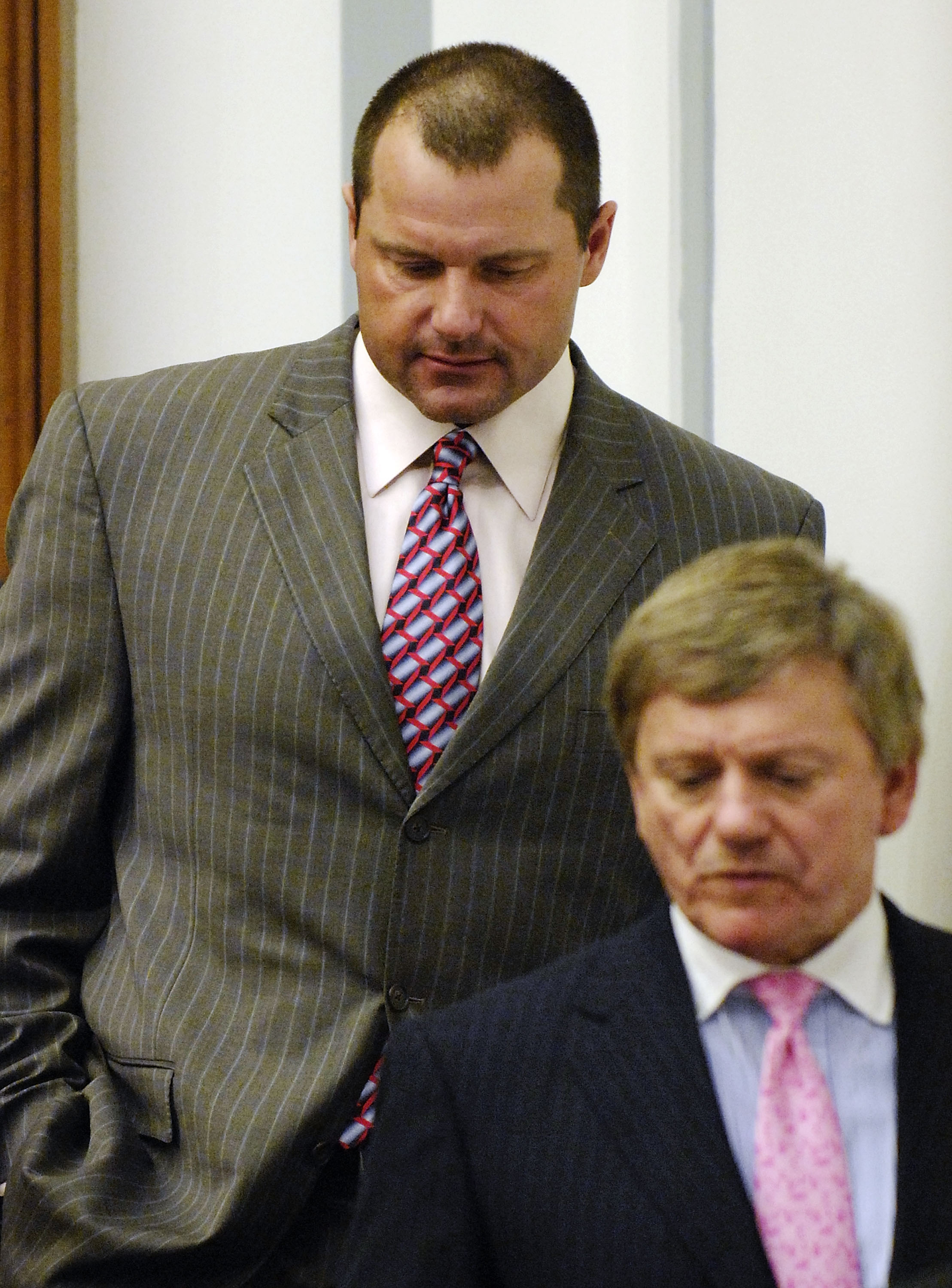 WASHINGTON - FEBRUARY 05:  Former New York Yankees pitcher Roger Clemens (R) departs with his attorneys Rusty Hardin (C) and Lanny Breuer (L),  after being deposed by the House Oversight and Government Reform Committee about steroid use in Major League Ba