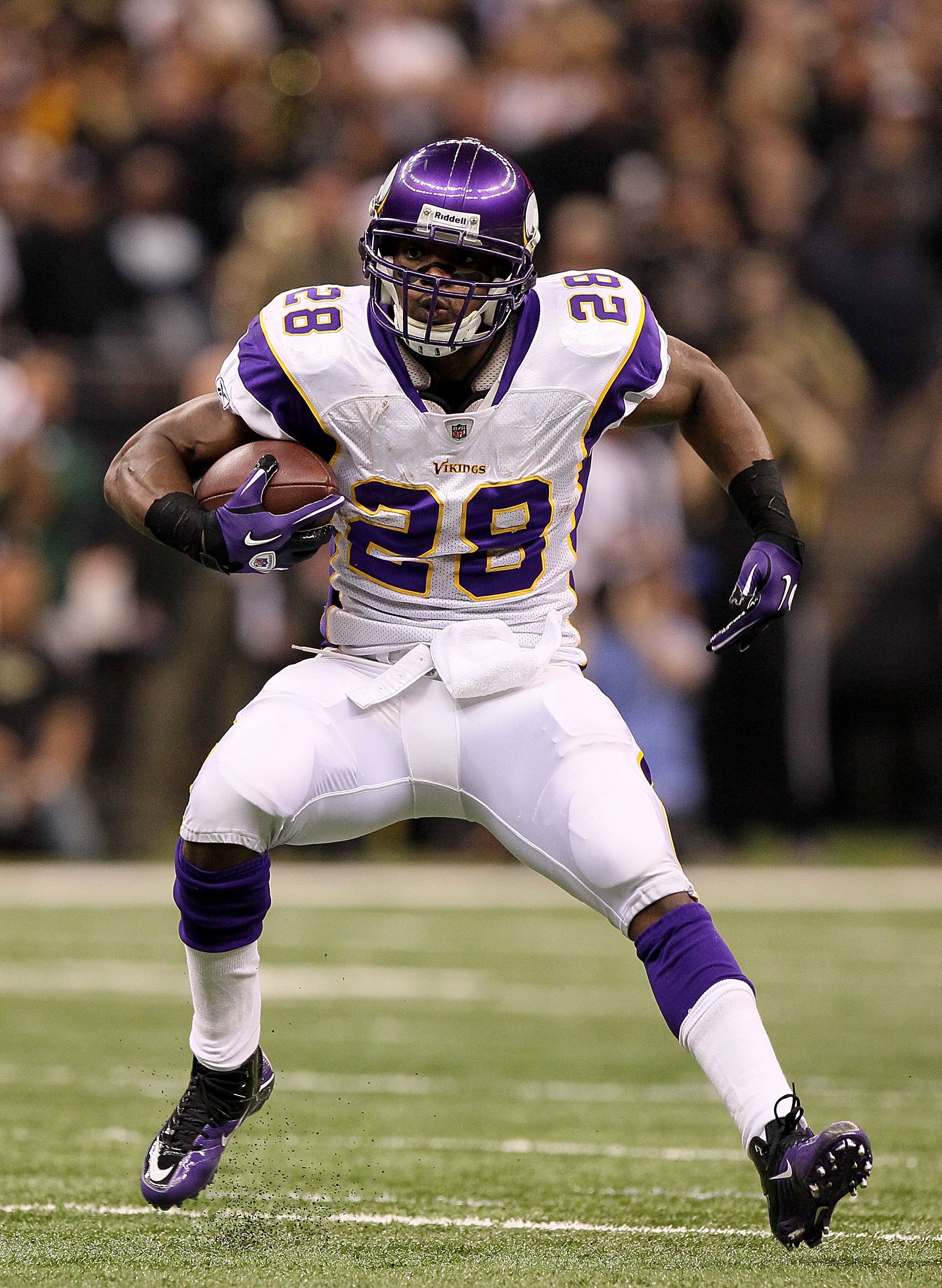 NO FILM, NO VIDEO, NO TV, NO DOCUMENTARY - The Minnesota Vikings' Percy  Harvin (12) tries to get back on his feet during a run against the New  Orleans Saints in the