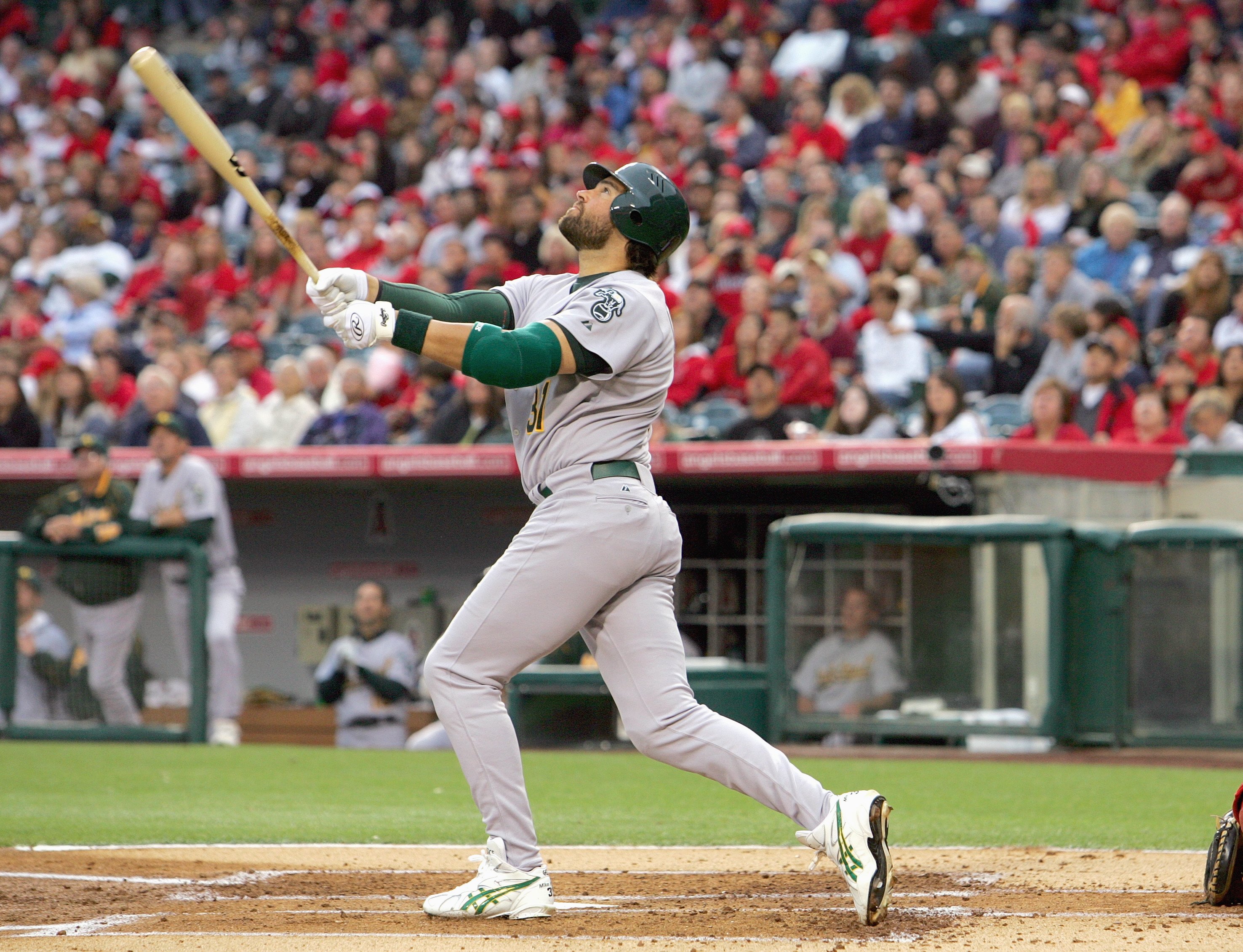 ANAHEIM, CA - AUGUST 27: Los Angeles Angels of Anaheim first baseman Albert  Pujols (5) in a 1980s California Angels style uniform during an at bat in  the second inning of a