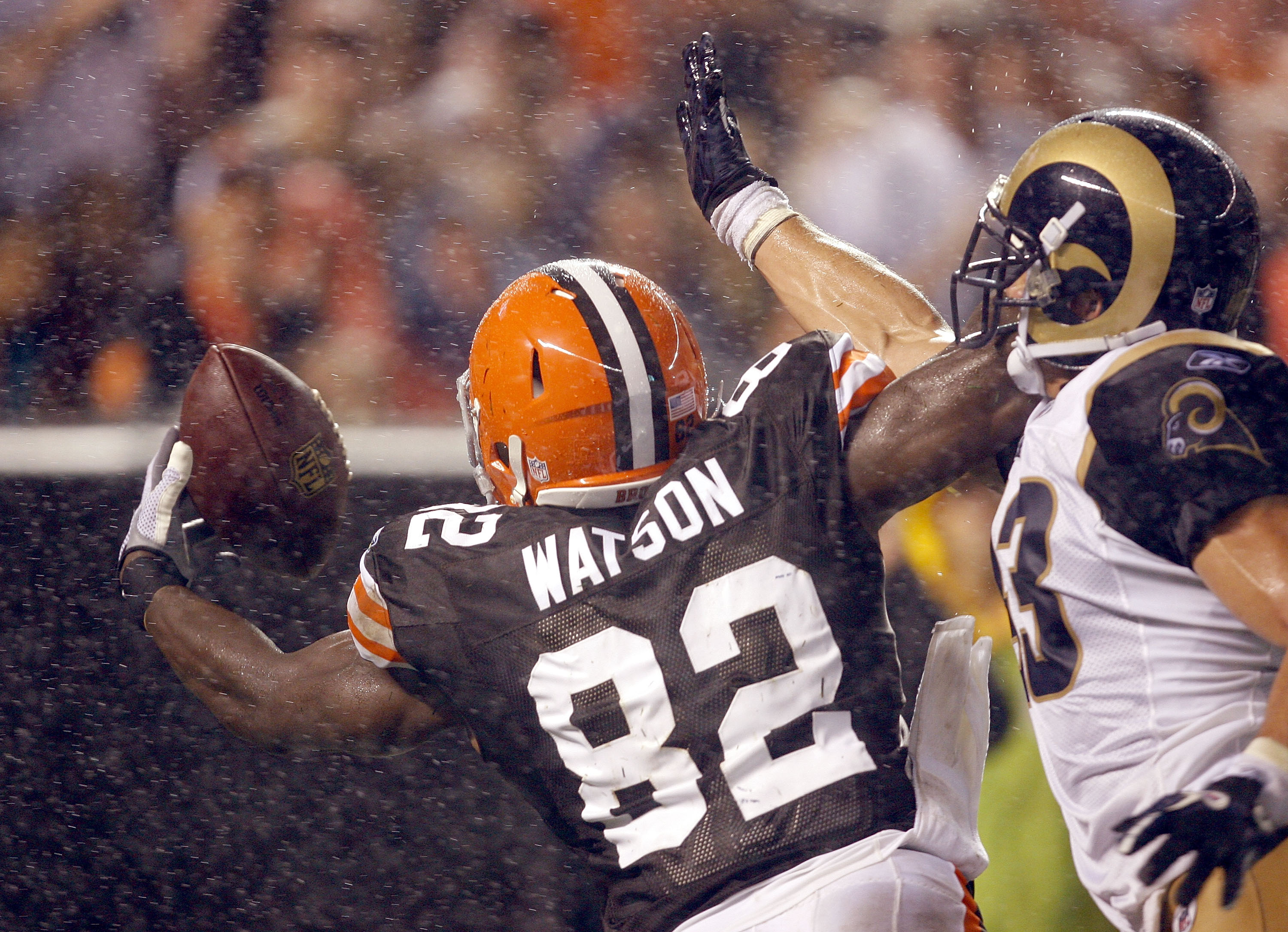 Cleveland Browns wide receiver Travis Benjamin runs the ball during  preseason NFL football game between the Browns and the St. Louis Rams  Saturday, Aug. 23, 2014, in Cleveland. (AP Photo/Tony Dejak Stock