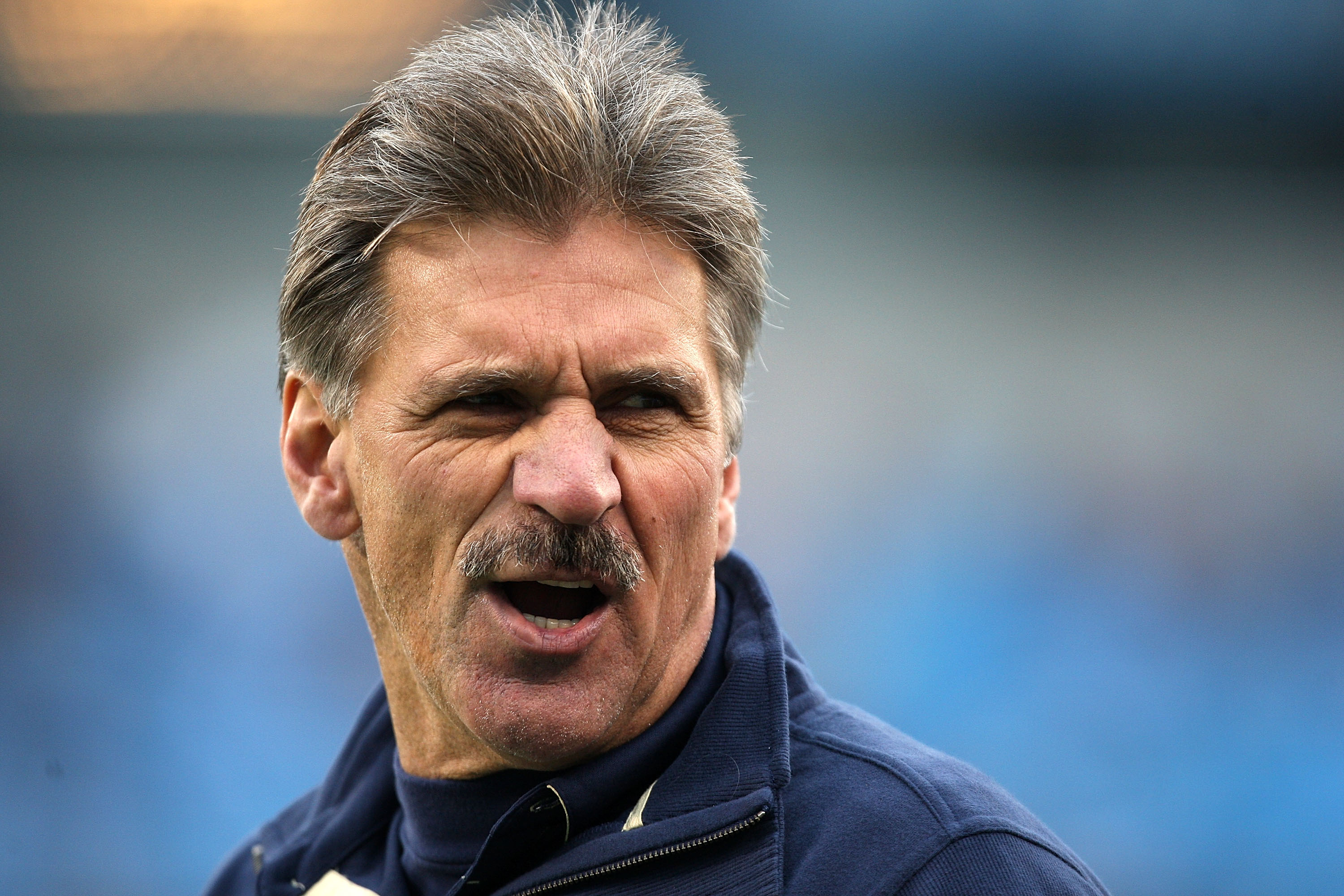 CHARLOTTE, NC - DECEMBER 26: Head coach Dave Wannstedt of the Pittsburgh Panthers smiles before the start of their game against the North Carolina Tar Heels on December 26, 2009 in Charlotte, North Carolina. (Photo by Streeter Lecka/Getty Images)