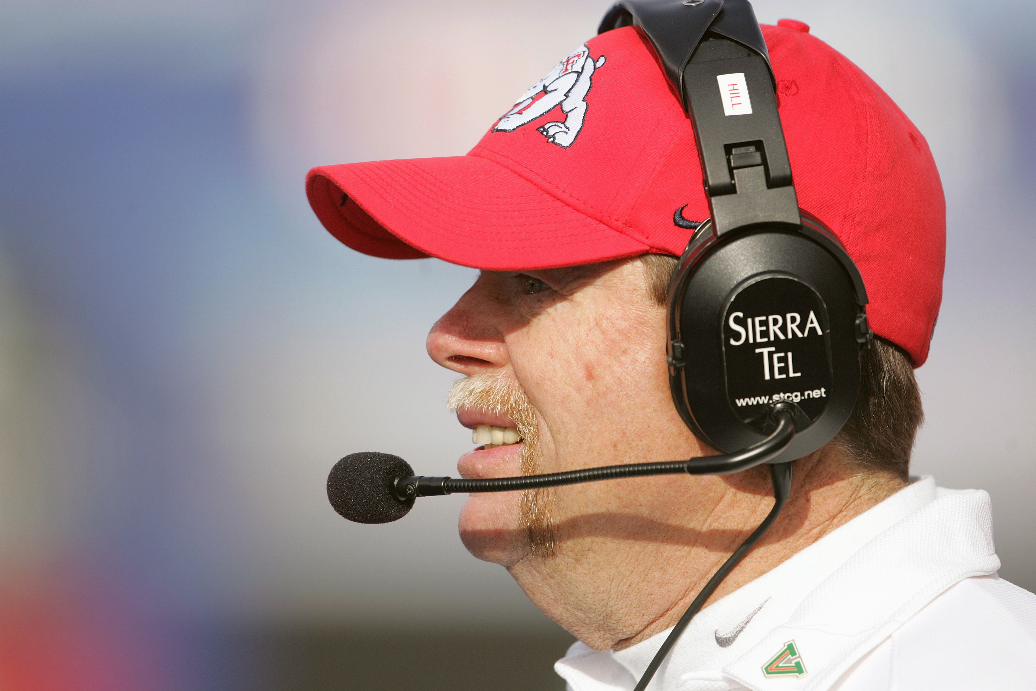 BOISE, ID - DECEMBER 27: Fresno State head coach Pat Hill of the Fresno State Bulldogs watches the Virginia Cavaliers during the MPC Computers Bowl at Bronco Stadium on December 27, 2004 in Boise, Idaho. Fresno State defeated Virginia in overtime 37-34.