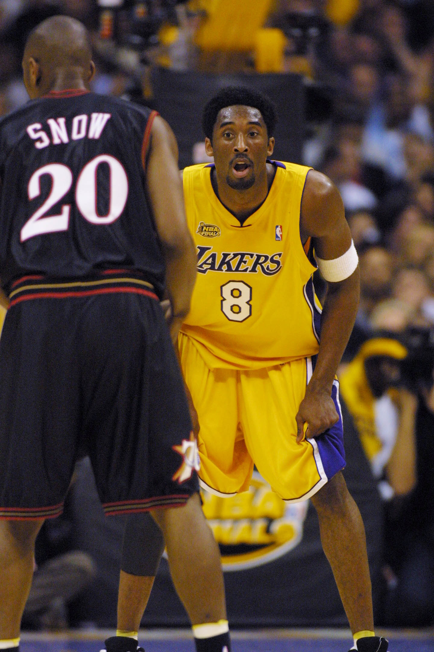 Kobe Bryant of the Los Angeles Lakers drives baseline against Doug