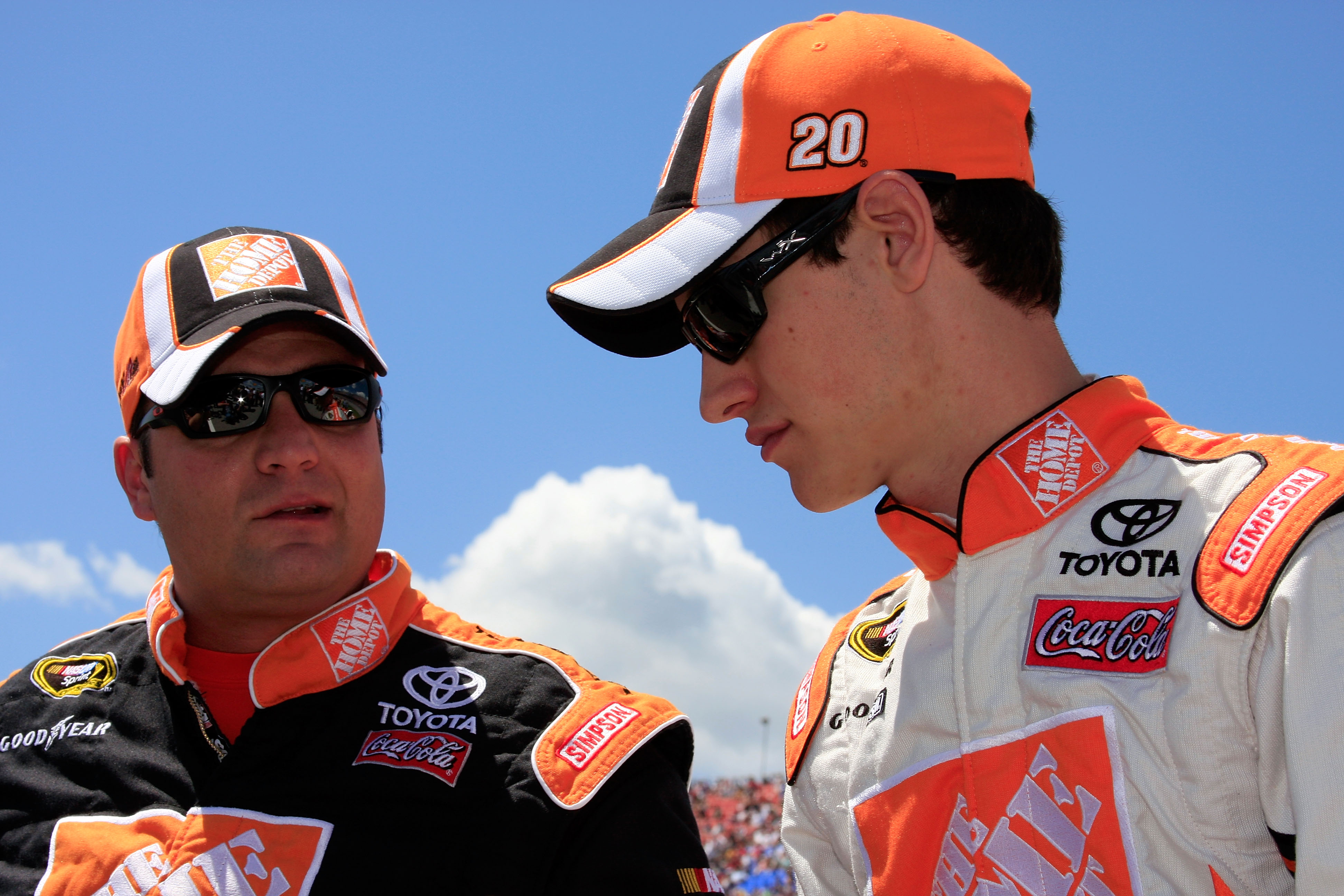 TALLADEGA, AL - APRIL 25:  Joey Logano (R), driver of the #20 Home Depot Toyota, talks with his crew chief Greg Zipadelli on the grid prior to thet start of the NASCAR Sprint Cup Series Aaron's 499 at Talladega Superspeedway on April 25, 2010 in Talladega