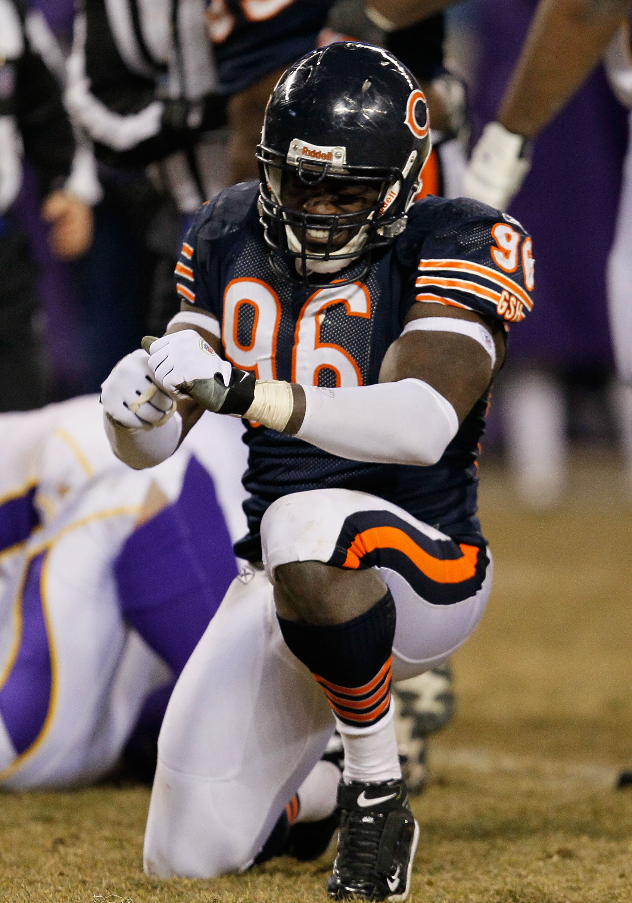 CHICAGO - DECEMBER 28: Alex Brown #96 of the Chicago Bears celebrates a sack of Brett Favre of the Minnesota Vikings at Soldier Field on December 28, 2009 in Chicago, Illinois. The Bears defeated the Vikings 36-30 in overtime. (Photo by Jonathan Daniel/Ge