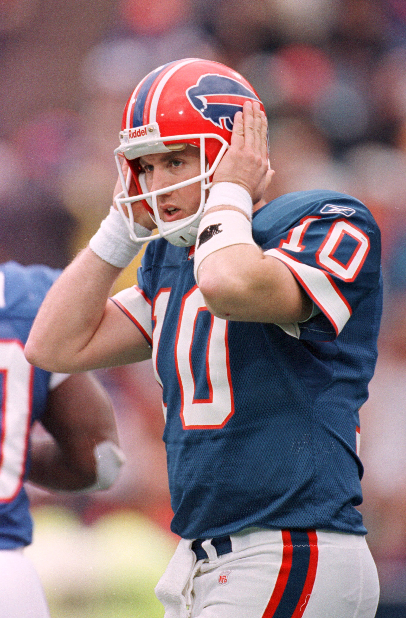 25 Nov 2001:  Alex Van Pelt #10 of the Buffalo Bills tries to hear instructions through his helmet headset against the Miami Dolphins during a game at Ralph Wilson Stadium in Orchard Park, New York. Miami won 34-27.