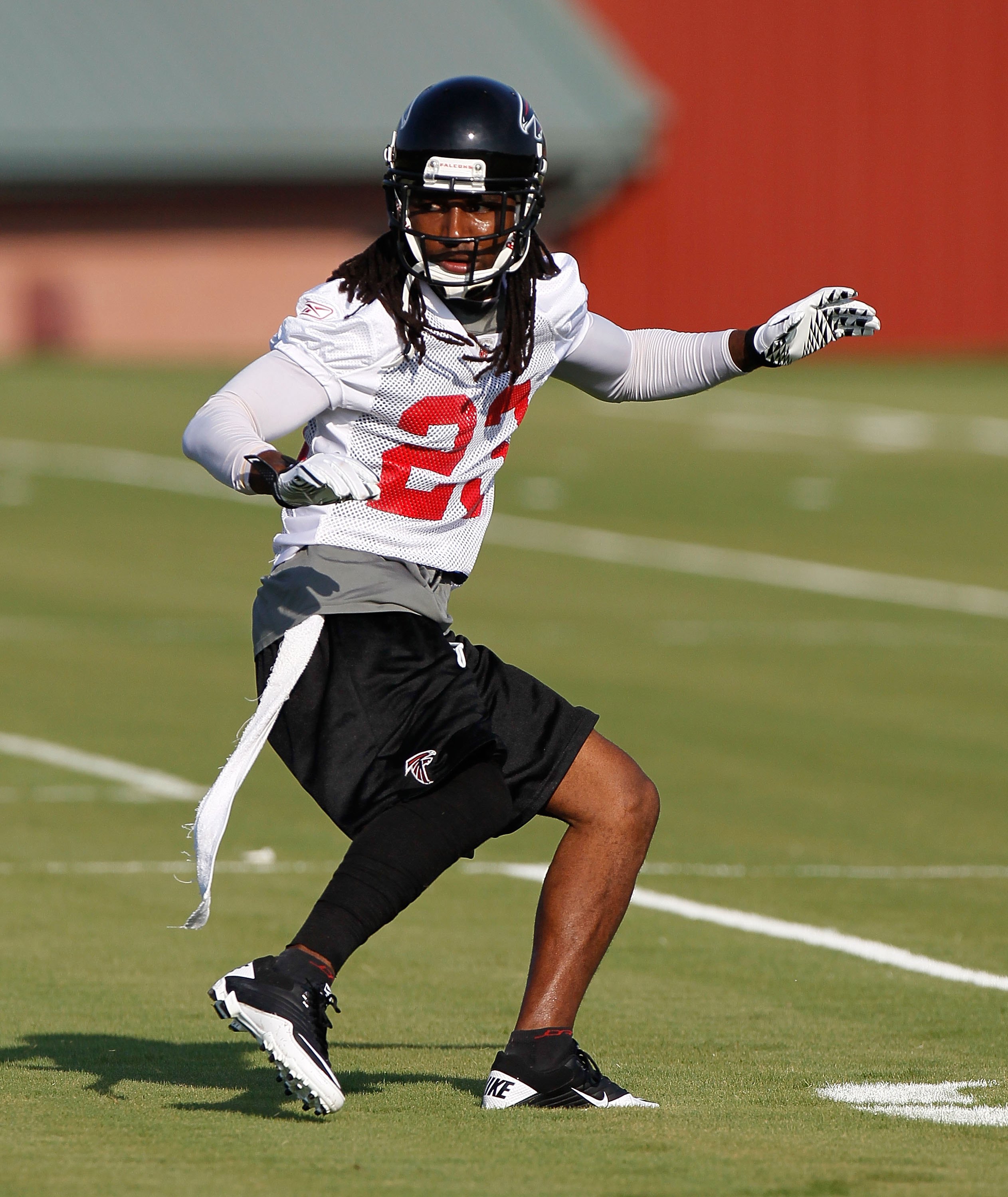 FLOWERY BRANCH, GA - JULY 30:  Dunta Robinson #23 of the Atlanta Falcons runs drills during opening day of training camp on July 30, 2010 at the Falcons Training Complex in Flowery Branch, Georgia.  (Photo by Kevin C. Cox/Getty Images)