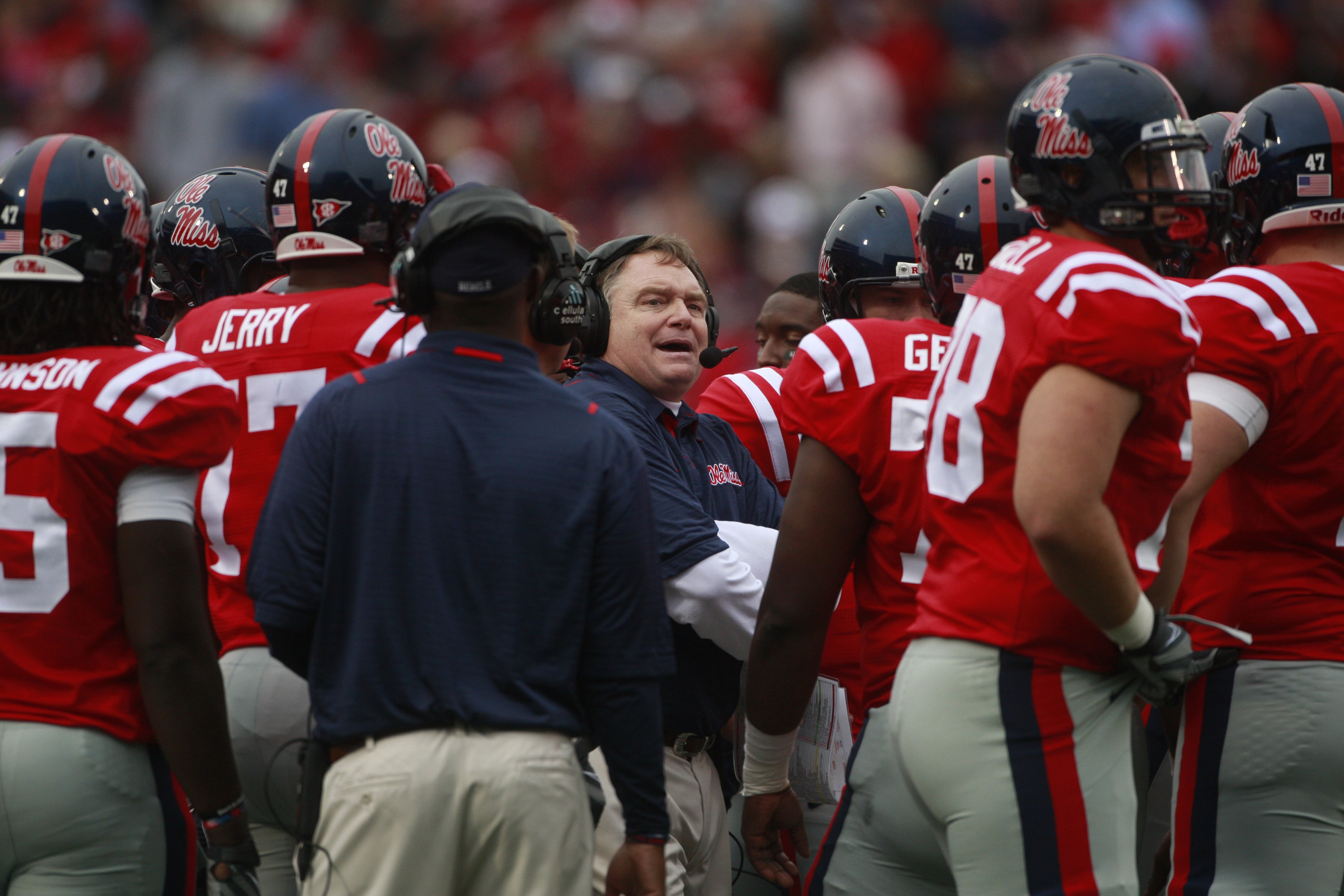 OXFORD, MS - OCTOBER 10: Coach Houston Nutt of the Mississippi Rebels talks with his offense during their game with the Alabama Crimson Tide at Vaught-Hemingway Stadium on October 10, 2009 in Oxford, Mississippi. (Photo by Dave Martin/Getty Images)
