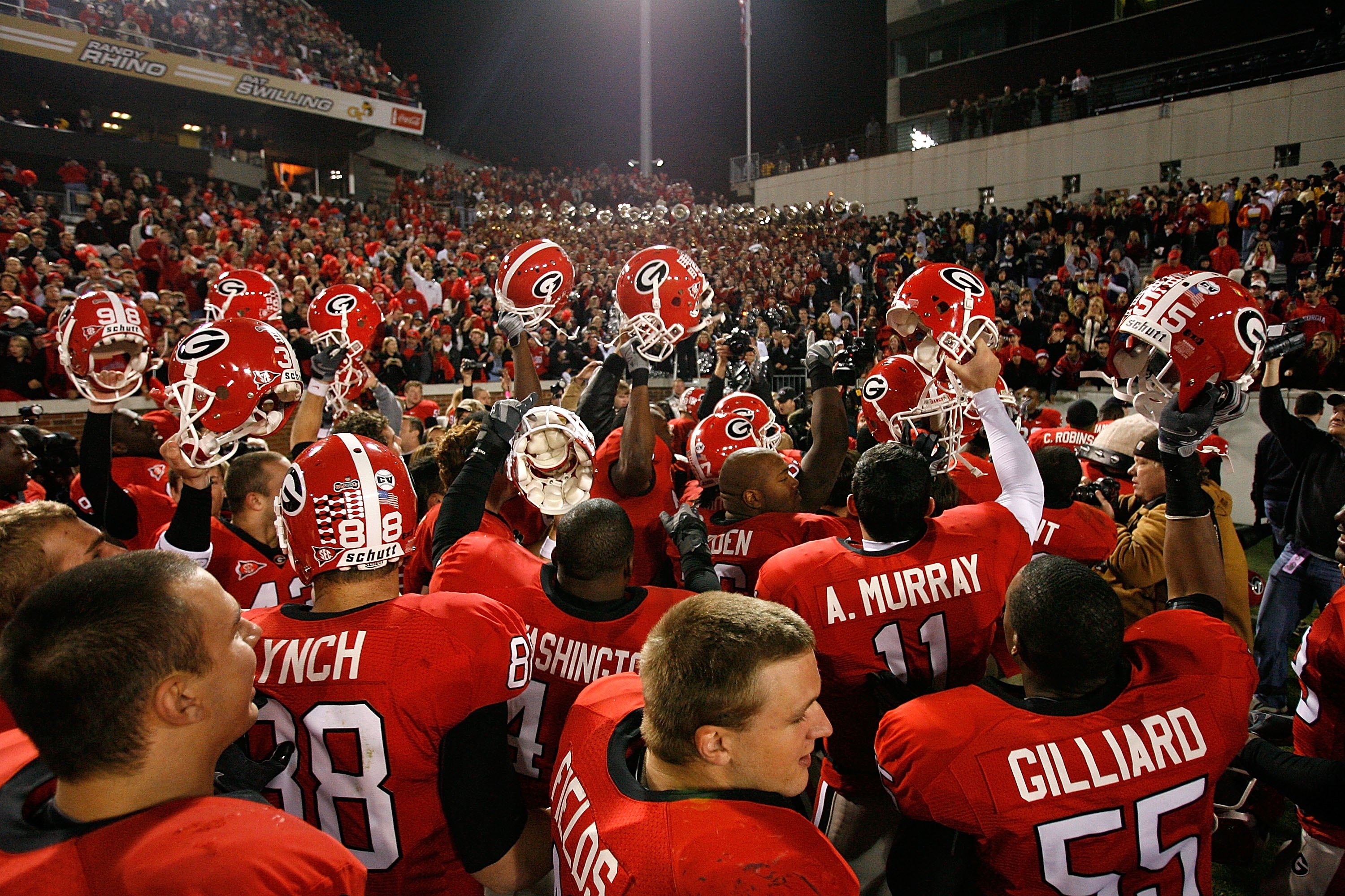 ATLANTA - NOVEMBER 28: The Georgia Bulldogs celebrate their 30-24 win over the Georgia Tech Yellow Jackets at Bobby Dodd Stadium on November 28, 2009 in Atlanta, Georgia. (Photo by Kevin C. Cox/Getty Images)