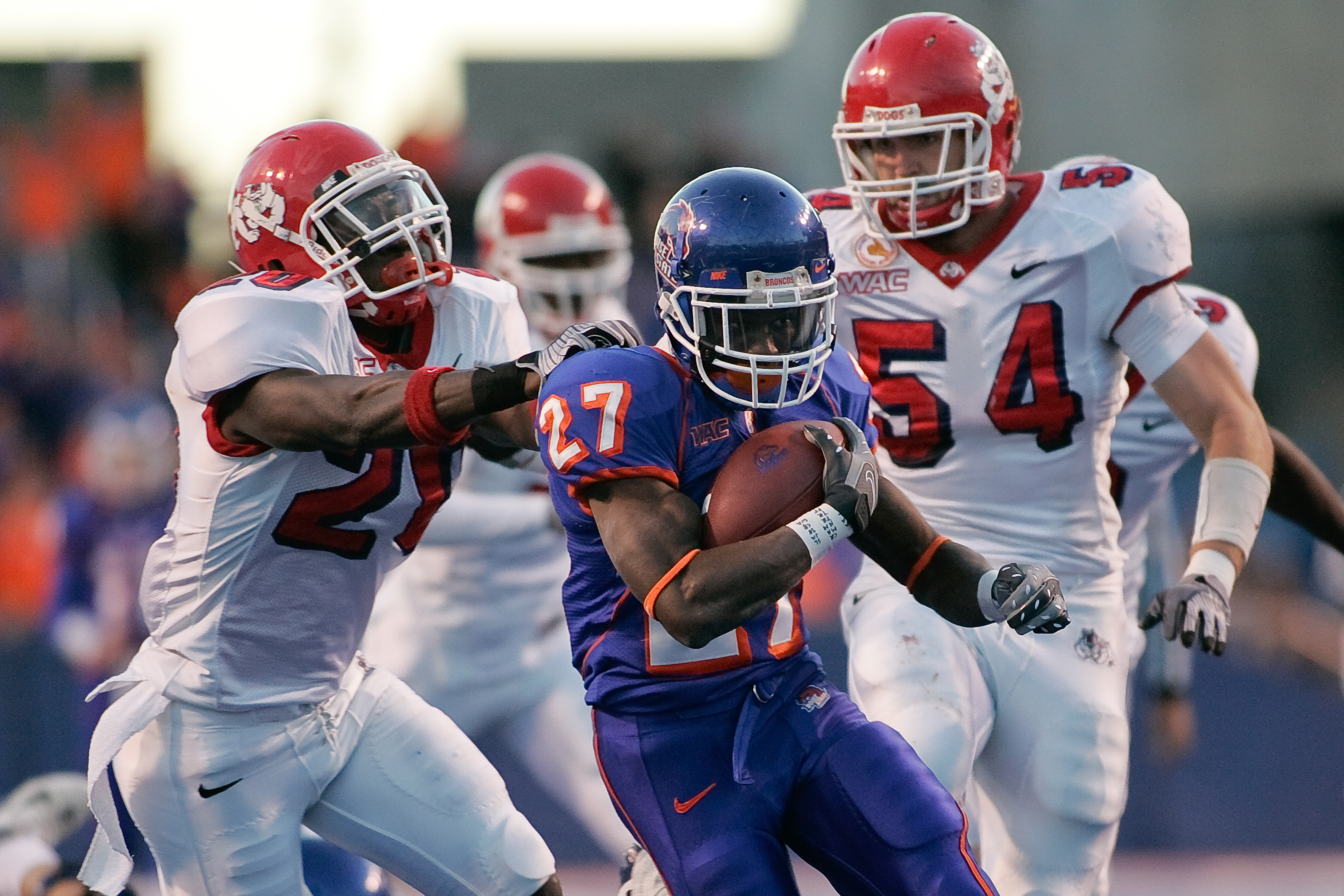 BOISE, ID - NOVEMBER 28: Jeremy Avery #27 of the Boise State Broncos runs against the Fresno State Bulldogs during their game on November 28, 2008 at Bronco Stadium in Boise, Idaho. (Photo by Otto Kitsinger III/Getty Images)