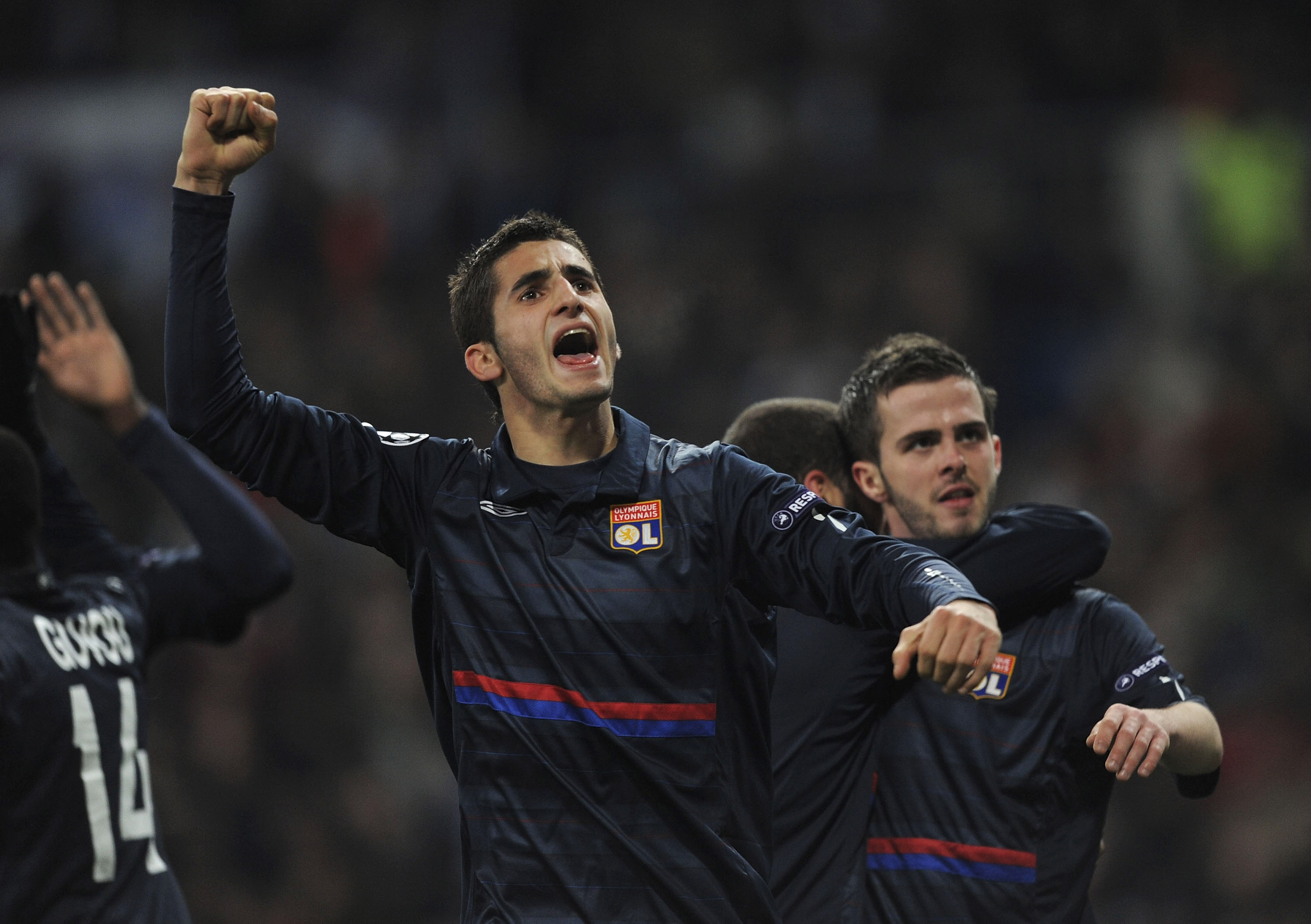 MADRID, SPAIN - MARCH 10:  Maxime Gonalons of Olympique Lyonnais celebrates after Lyonnais' scored their first goal during the UEFA Champions League round of 16 2nd leg match between  Real Madrid and Olympique Lyonnais at Estadio Santiago Bernabeu on Marc