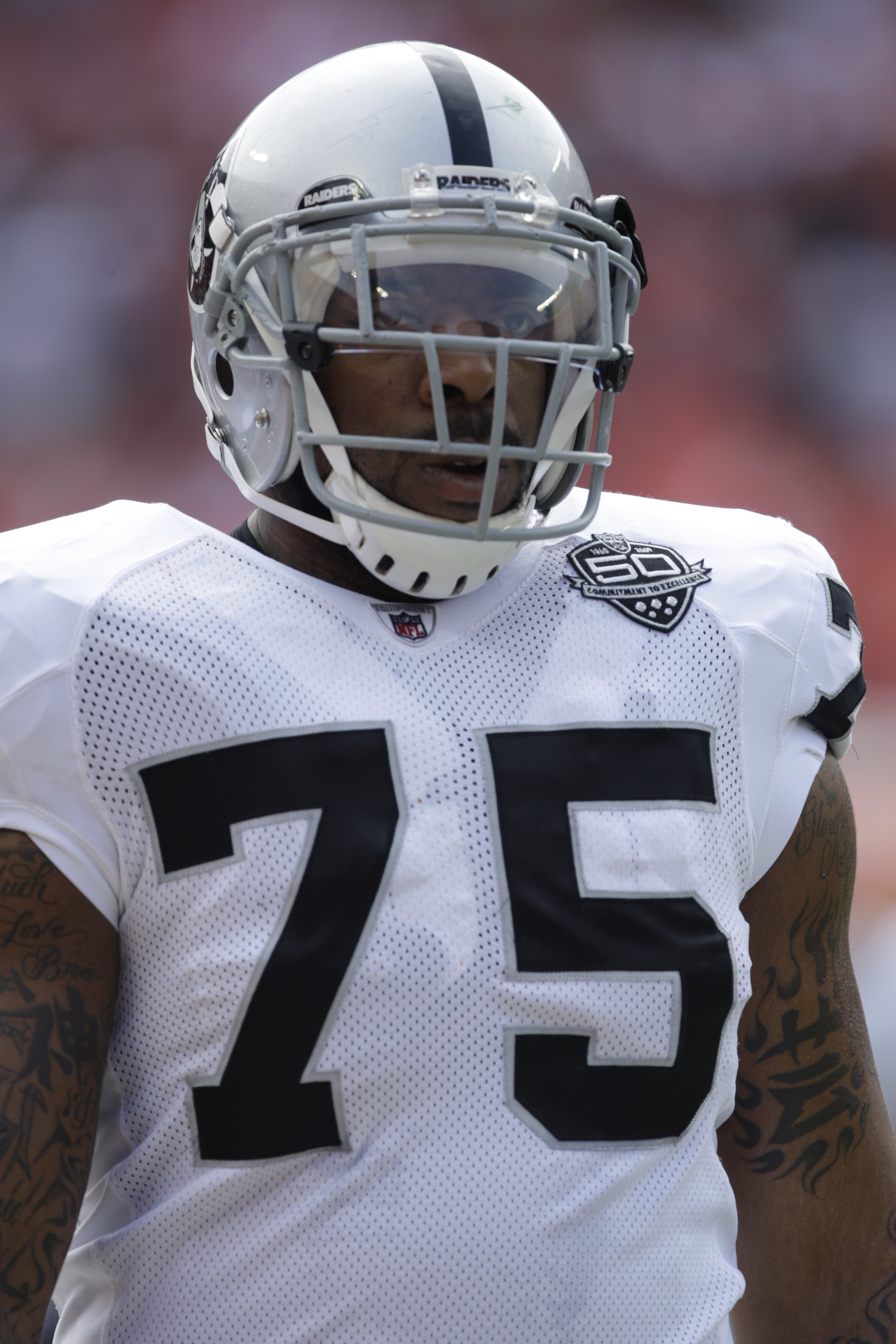 KANSAS CITY, MO - SEPTEMBER 20:  Mario Henderson #75 of the Oakland Raiders looks on during the game against the Kansas City Chiefs at Arrowhead Stadium on September 20, 2009 in Kansas City, Missouri. (Photo by Jamie Squire/Getty Images)