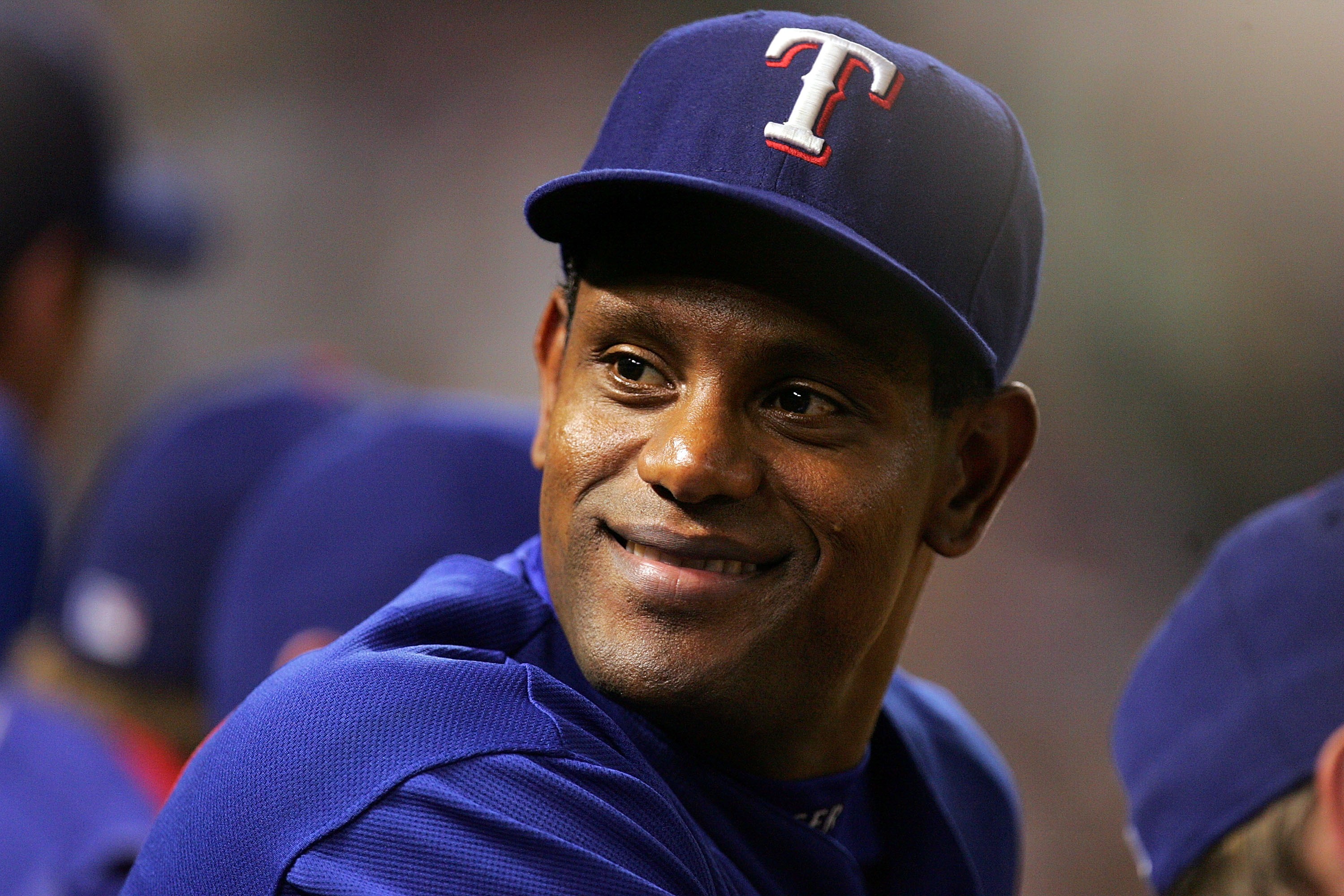 Texas Rangers' Sammy Sosa celebrates after hitting a home run in the second  inning agaisnt the Chicago White Sox at Rangers Ballpark in Arlington,  Texas, on Thursday, August 30, 2007. (Photo by