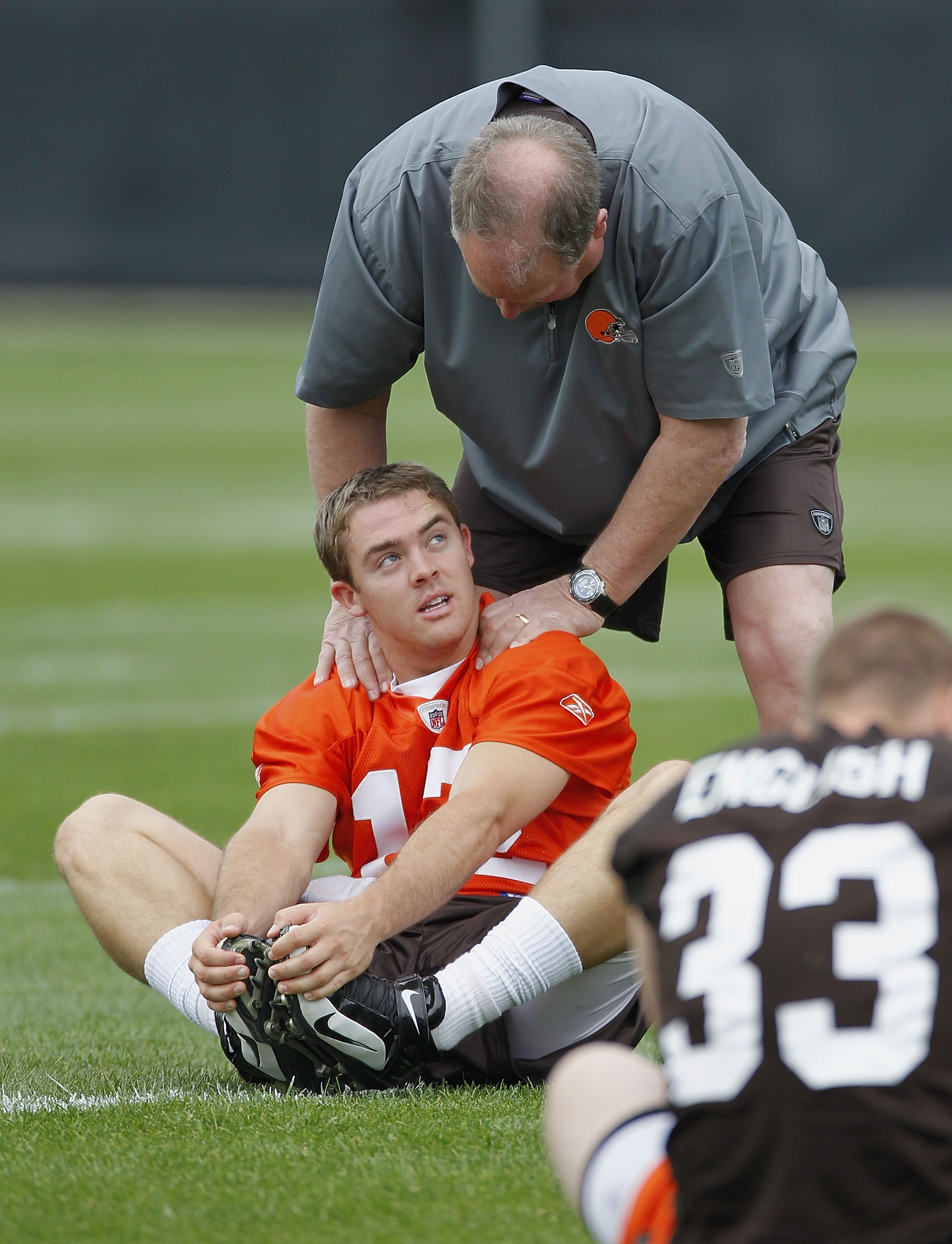 BEREA, OH - MAY 01:  Colt McCoy #12 of the Cleveland Browns talks with team president Mike Holmgren during rookie mini camp at the Cleveland Browns Training and Administrative Complex on May 1, 2010 in Berea, Ohio.  (Photo by Gregory Shamus/Getty Images)