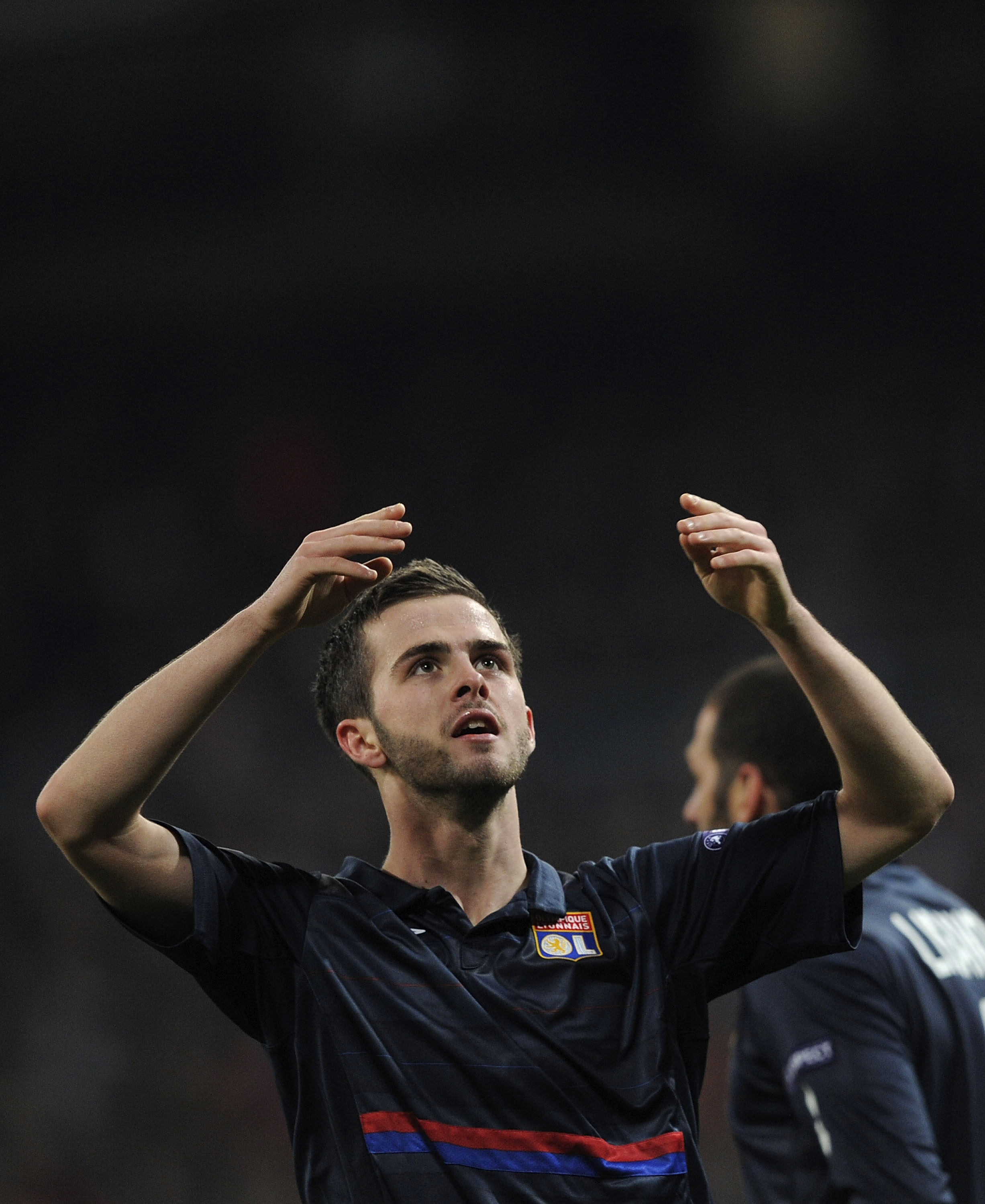 MADRID, SPAIN - MARCH 10:  Miralem Pjanic of Olympique Lyon celebrates after scoring Lyonnais' first goal during the UEFA Champions League round of 16 2nd leg match between Real Madrid and Olympique Lyonnais at Estadio Santiago Bernabeu on March 10, 2010
