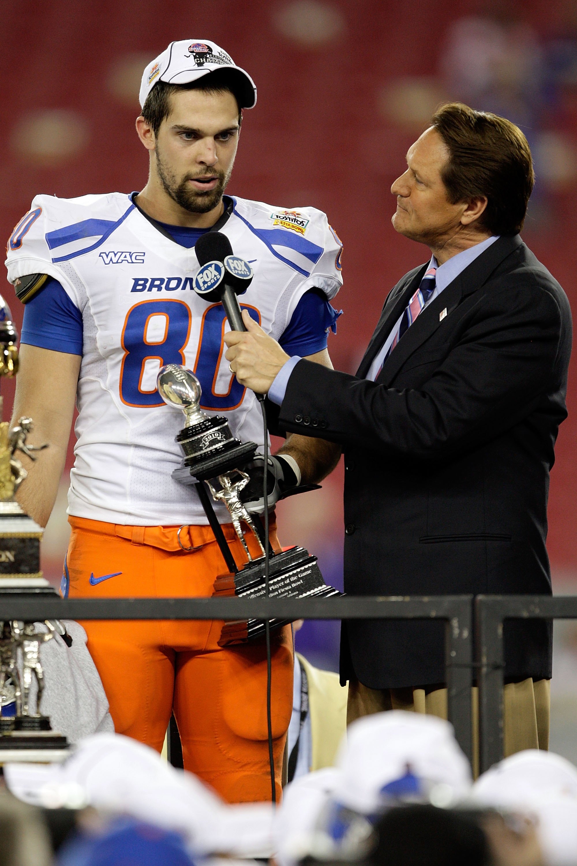GLENDALE, AZ - JANUARY 04: Kyle Efaw #80 of the Boise State Broncos answers questions from Fox Sports' Chris Myers with his offensive MVP award after defeating the TCU Horned Frogs 17-10 during the Tostitos Fiesta Bowl at the Universtity of Phoenix Stad