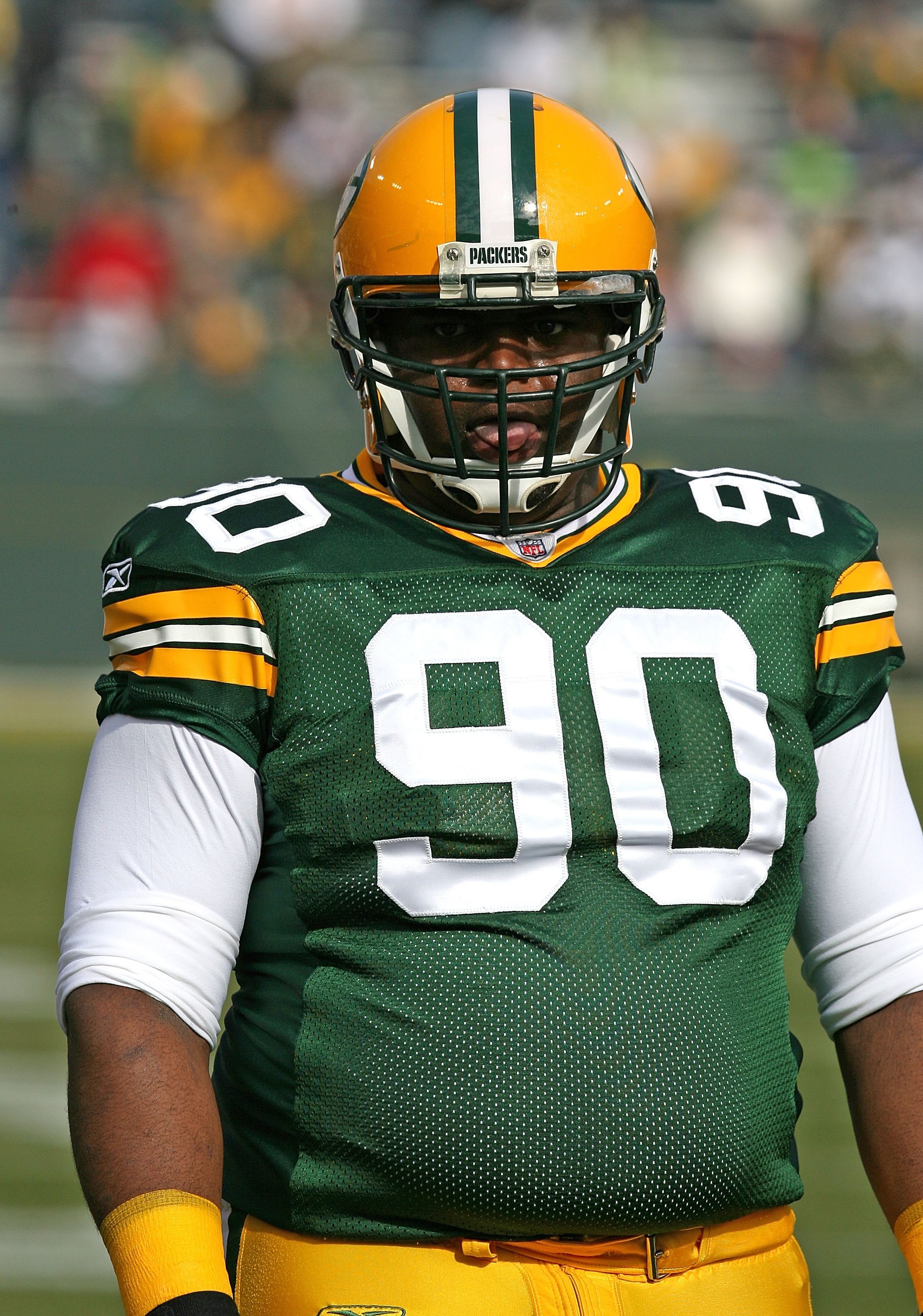 09 September 2007: Green Bay Packers defensive end Aaron Kampman (R) grabs  Philadelphia Eagles quarterback Donovan McNabb (5) in the second quarter at  Lambeau Field in Green Bay, Wisconsin. The Eagles lost