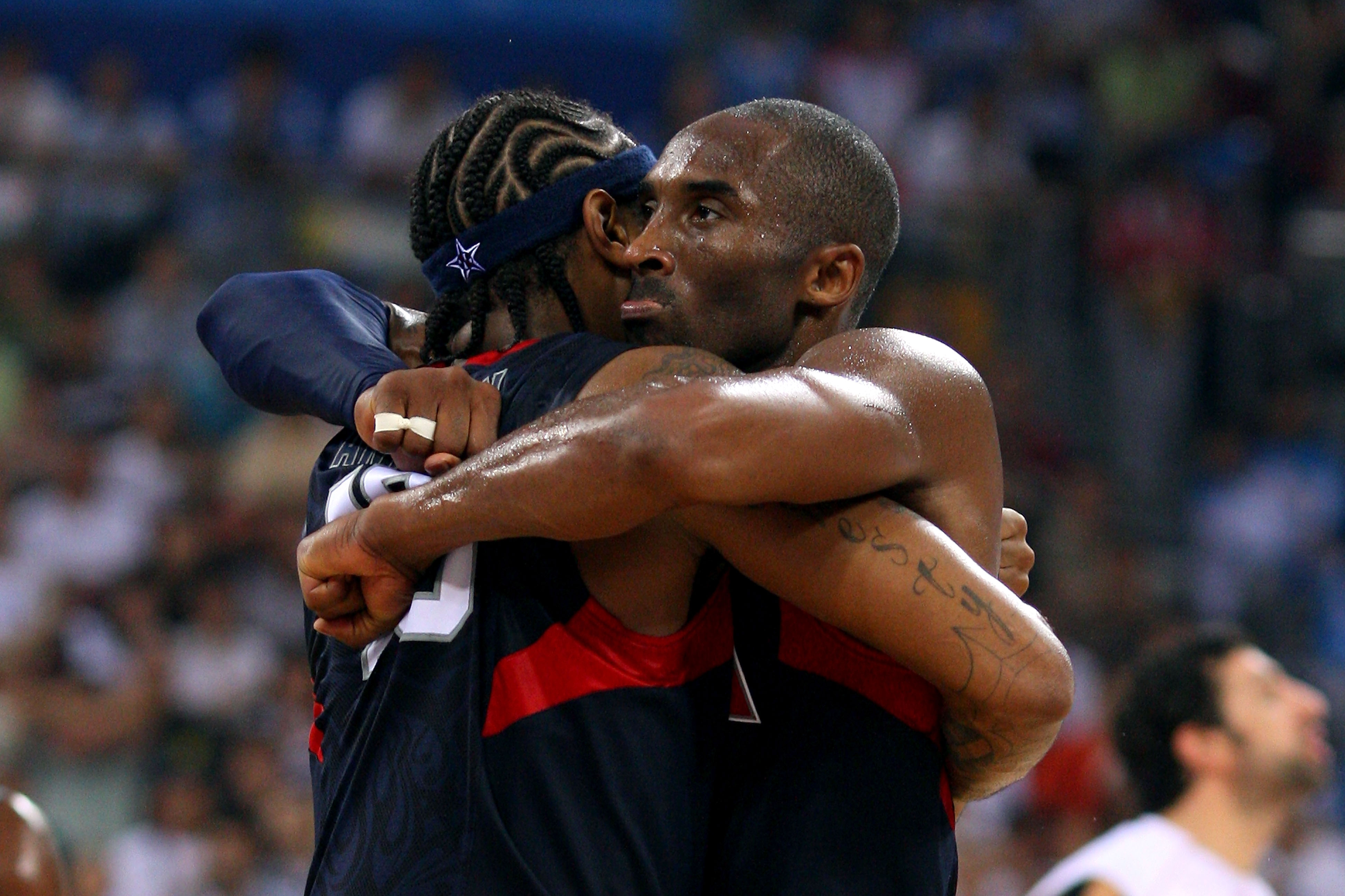 BEIJING - AUGUST 24: Kobe Bryant #10 and Carmelo Anthony #15 of the United States embrace after defeating Spain 118-107 in the gold medal game during Day 16 of the Beijing 2008 Olympic Games at the Beijing Olympic Basketball Gymnasium on August 24, 2008 i
