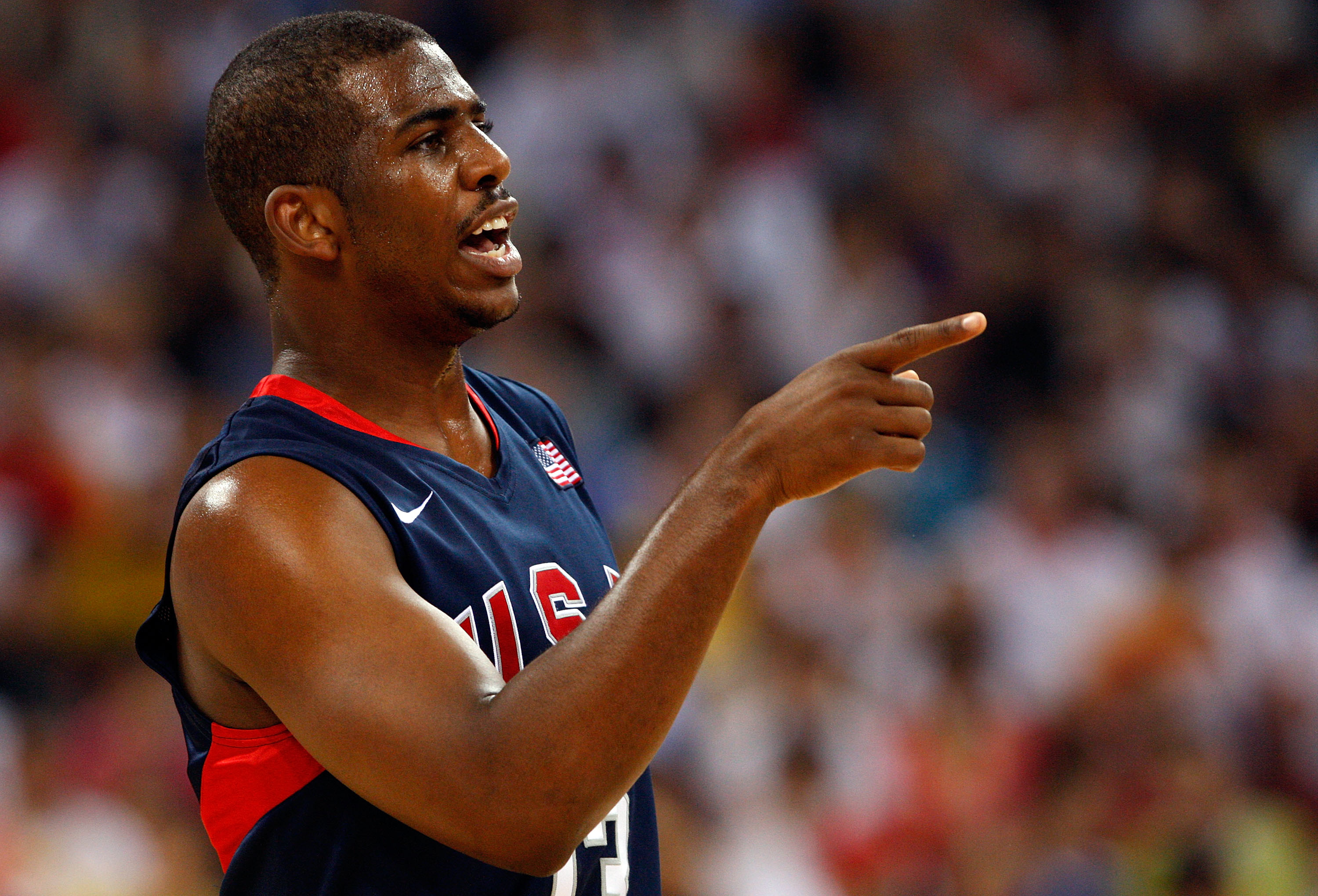 BEIJING - AUGUST 24:  Chris Paul #13 of the United States signals to teammates during the gold medal game against Spain during Day 16 of the Beijing 2008 Olympic Games at the Beijing Olympic Basketball Gymnasium on August 24, 2008 in Beijing, China.  (Pho