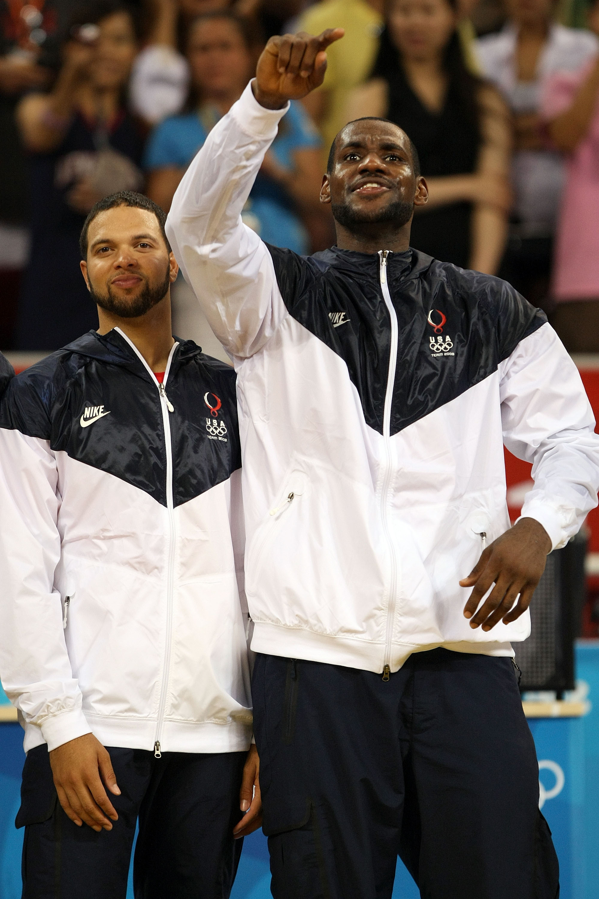 BEIJING - AUGUST 24:  (L-R)  Deron Williams #6 and LeBron James of the United States wait to receive the gold medal after defeating Spain in the men's basketball final during Day 16 of the Beijing 2008 Olympic Games at the Beijing Olympic Basketball Gymna
