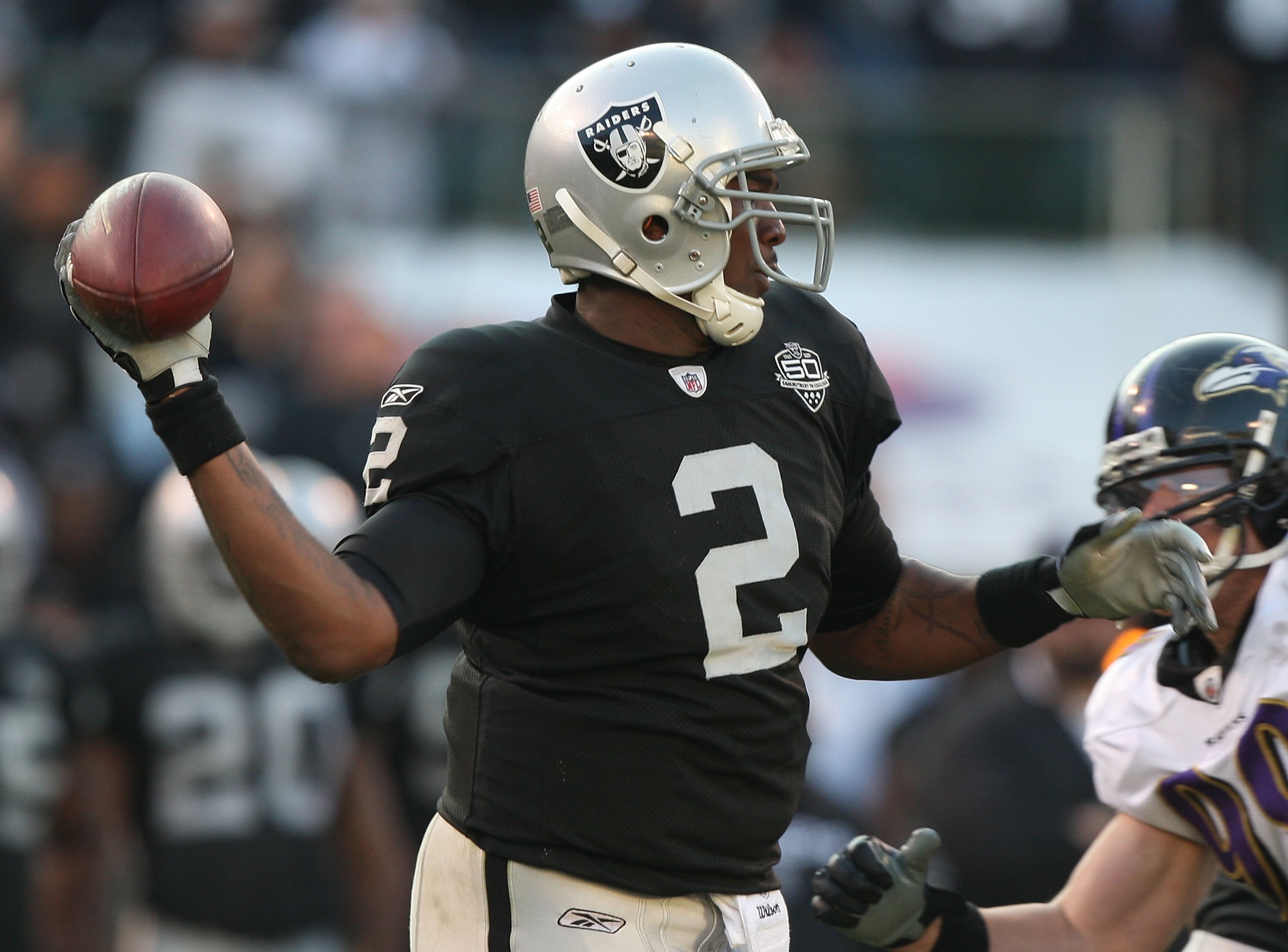 OAKLAND, CA - JANUARY 03:  JaMarcus Russell #2 of the Oakland Raiders in action  against the Baltimore Ravens during an NFL game at Oakland-Alameda County Coliseum on January 3, 2010 in Oakland, California.  (Photo by Jed Jacobsohn/Getty Images)