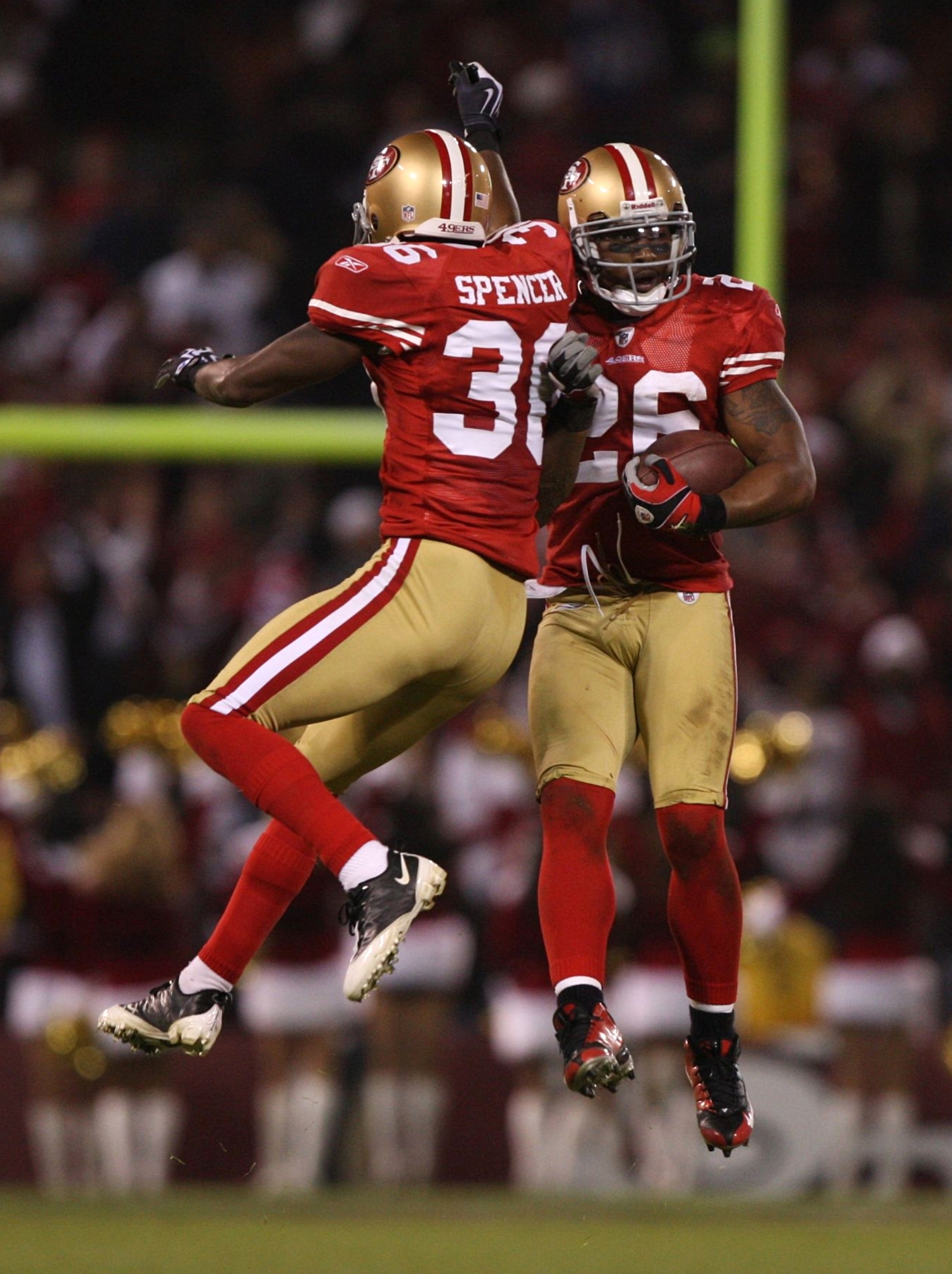 San Francisco 49ers' Shawntae Spencer (36) intercepts a pass