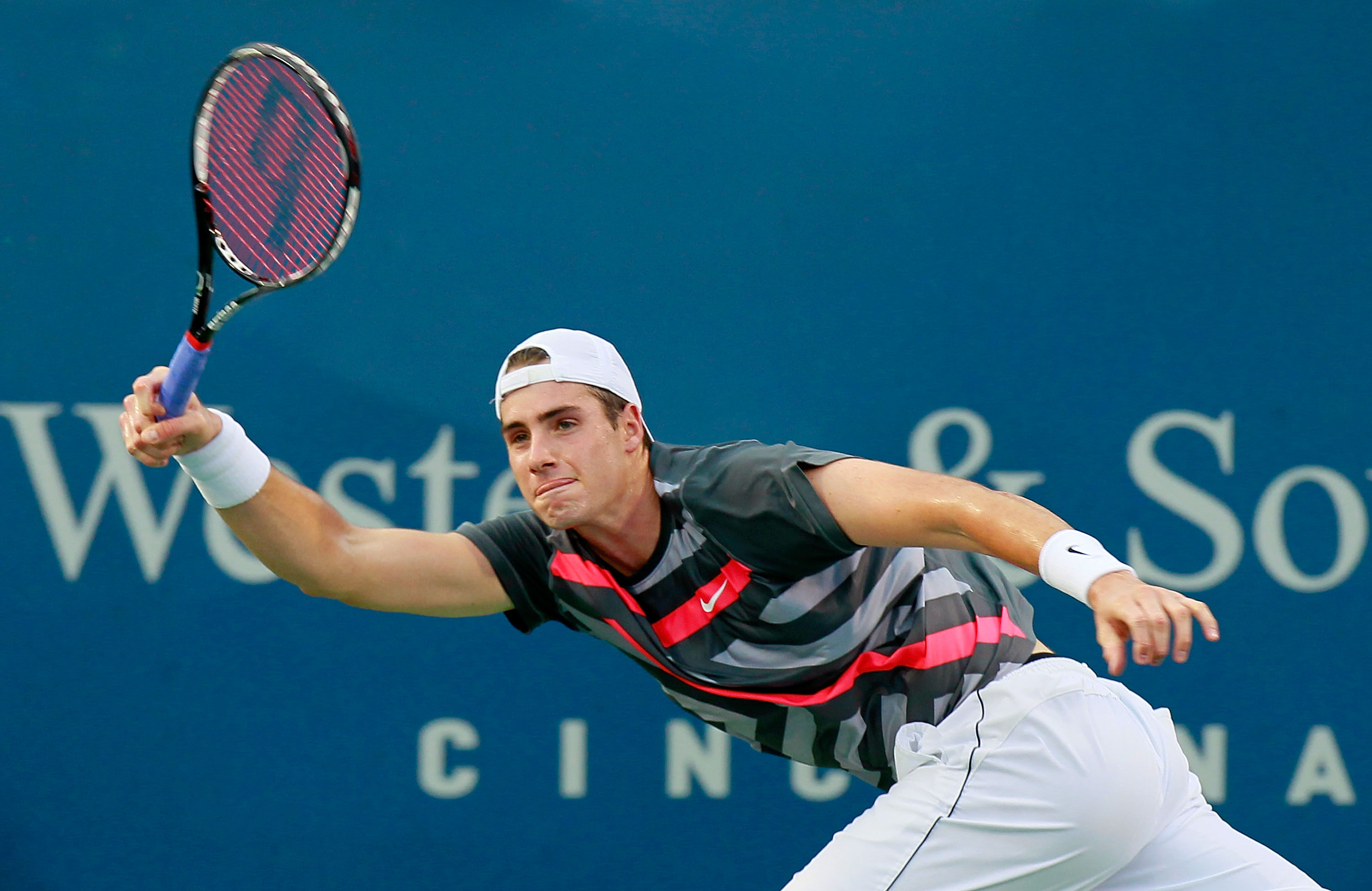 CINCINNATI - AUGUST 17:  John Isner returns a forehand to Lukasz Kubot of Poland during Day 2 of the Western & Southern Financial Group Masters at the Lindner Family Tennis Center on August 17, 2010 in Cincinnati, Ohio.  (Photo by Kevin C. Cox/Getty Image