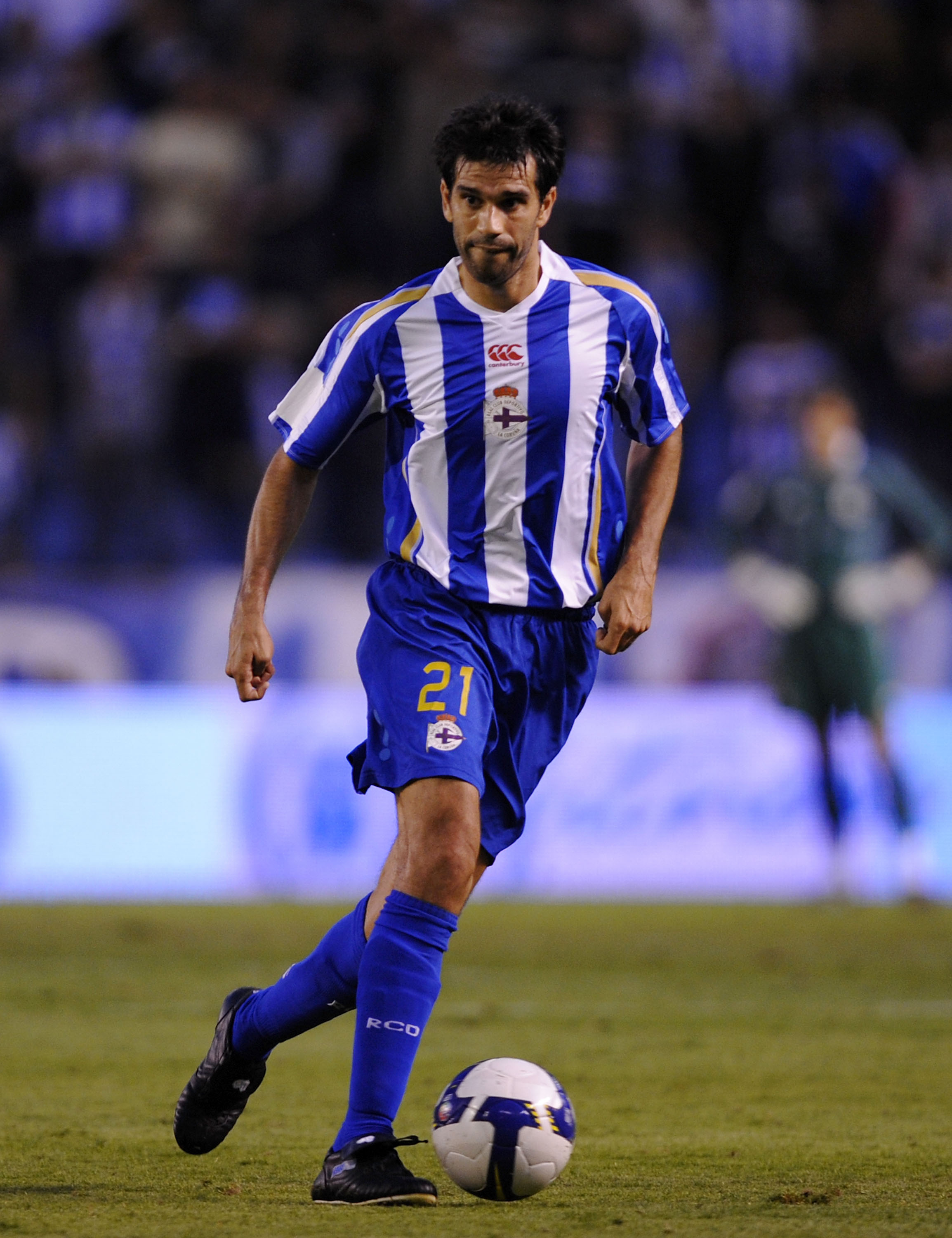 A CORUNA, SPAIN - AUGUST 14:  Juan Carlos Valeron of Deportivo La Coruna goes for the ball during the UEFA Cup Second Qualifying Round, first leg between Deportivo La Coruna and Hadjuk Split at the Riazor stadium on August 14, 2008 in A Coruna, Spain.  (P