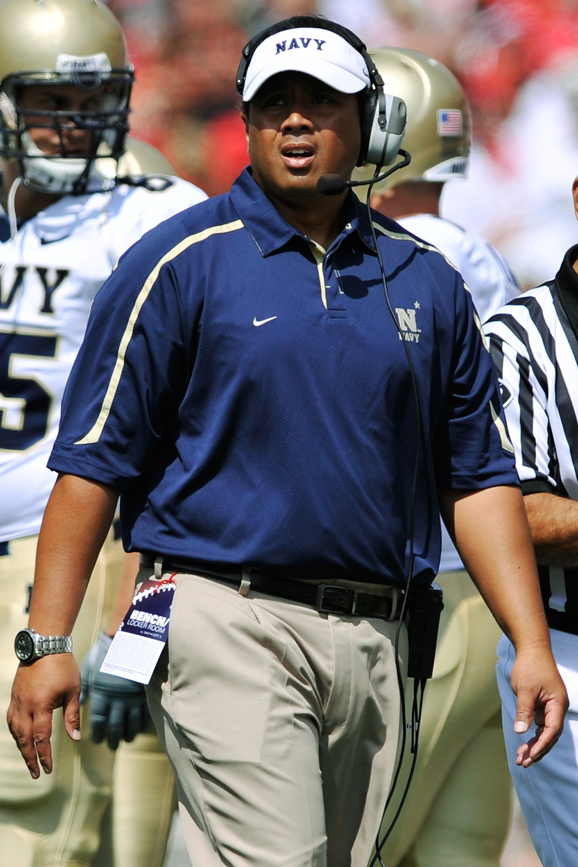 COLUMBUS, OH - SEPTEMBER 05:  Head coach Ken Niumatalolo of the Navy Midshipmen checks the clock during a game against the Ohio State Buckeyes at Ohio Stadium on September 5, 2009 in Columbus, Ohio.  (Photo by Jamie Sabau/Getty Images)