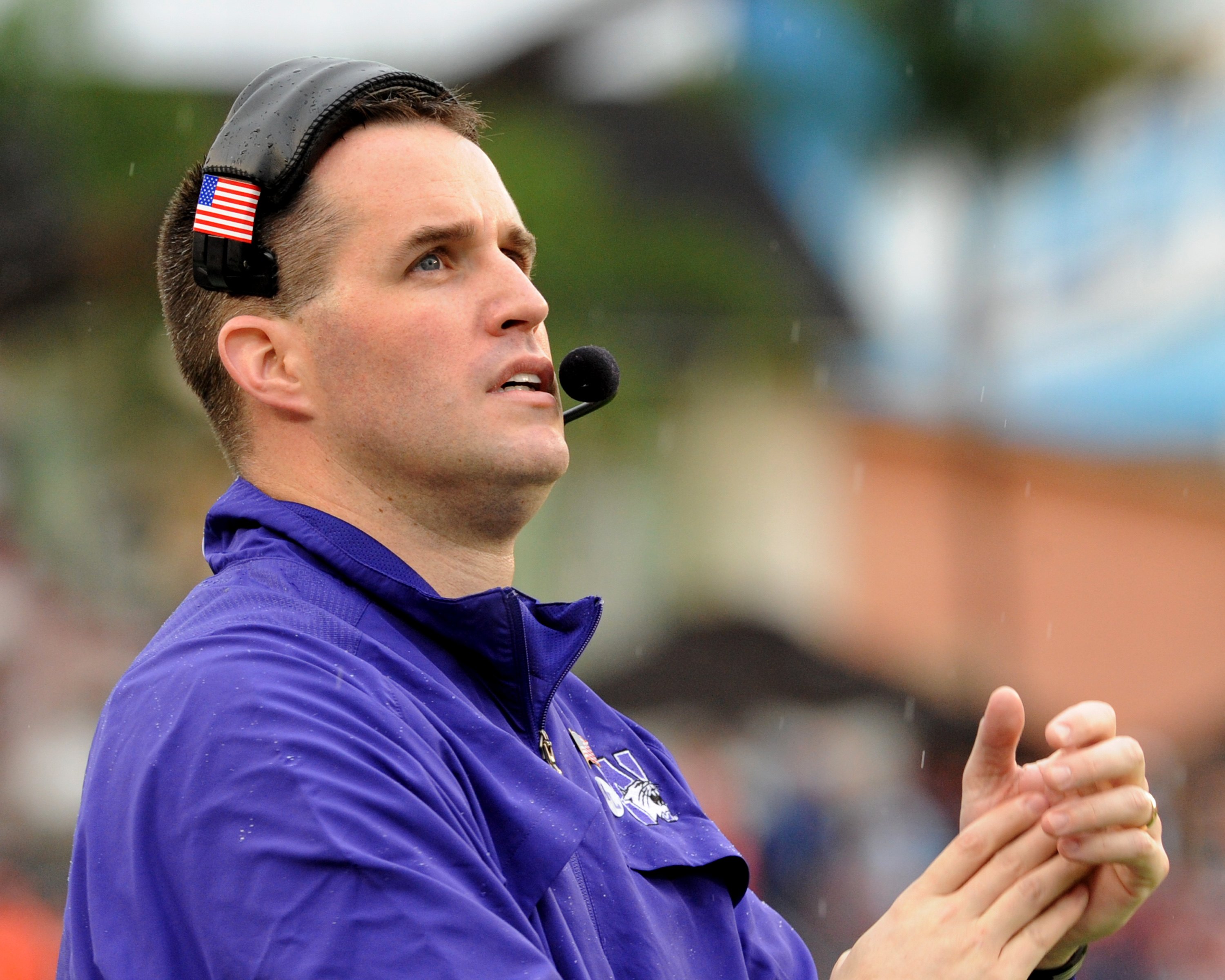 TAMPA, FL - JANUARY 1: Coach Pat Fitzgerald of the Northwestern Wildcats directs play against the Auburn Tigers in the Outback Bowl January 1, 2010 at Raymond James Stadium in Tampa, Florida.  (Photo by Al Messerschmidt/Getty Images)