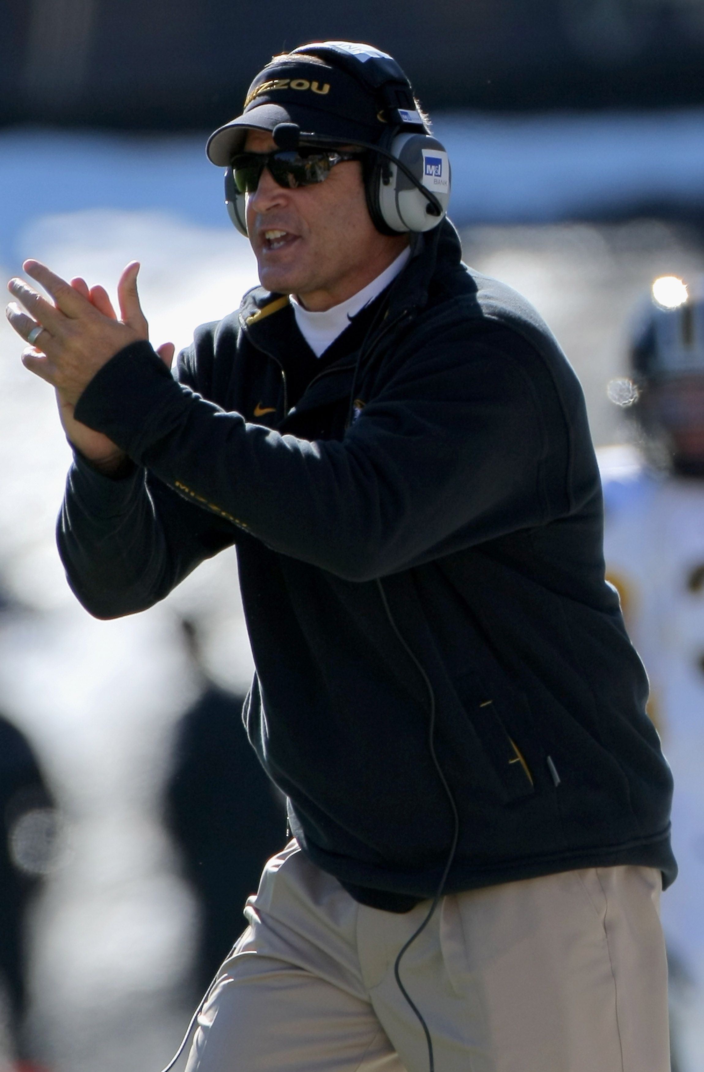 BOULDER, CO - OCTOBER 31:  Head coach Gary Pinkel of the Missouri Tigers leads his team against the Colorado Buffaloes at Folsom Field on October 31, 2009 in Boulder, Colorado.  (Photo by Doug Pensinger/Getty Images)