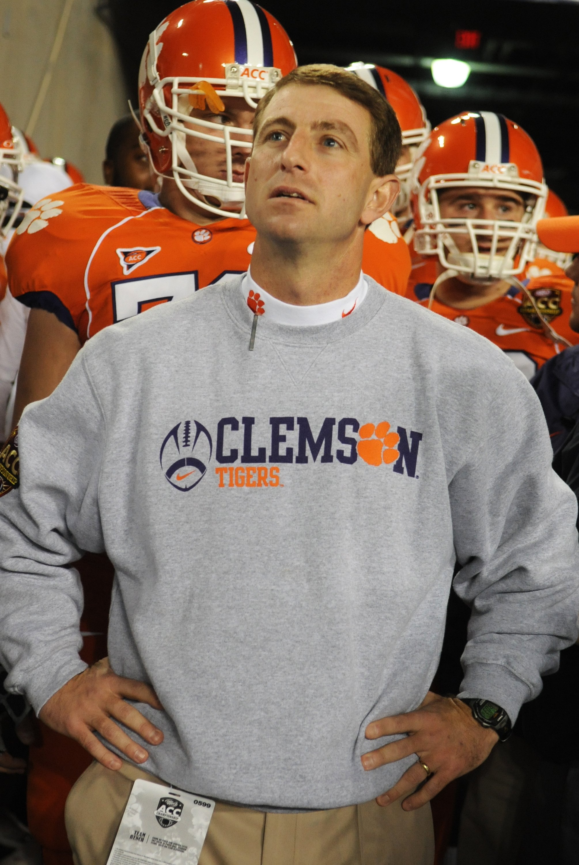 TAMPA, FL - NOVEMBER 28: Coach Dabo Swinney of the Clemson Tigers checks the scoreboard before play against the Georgia Tech Yellow Jackets in the 2009 ACC Football Championship Game December 5, 2009 at Raymond James Stadium in Tampa, Florida.  (Photo by