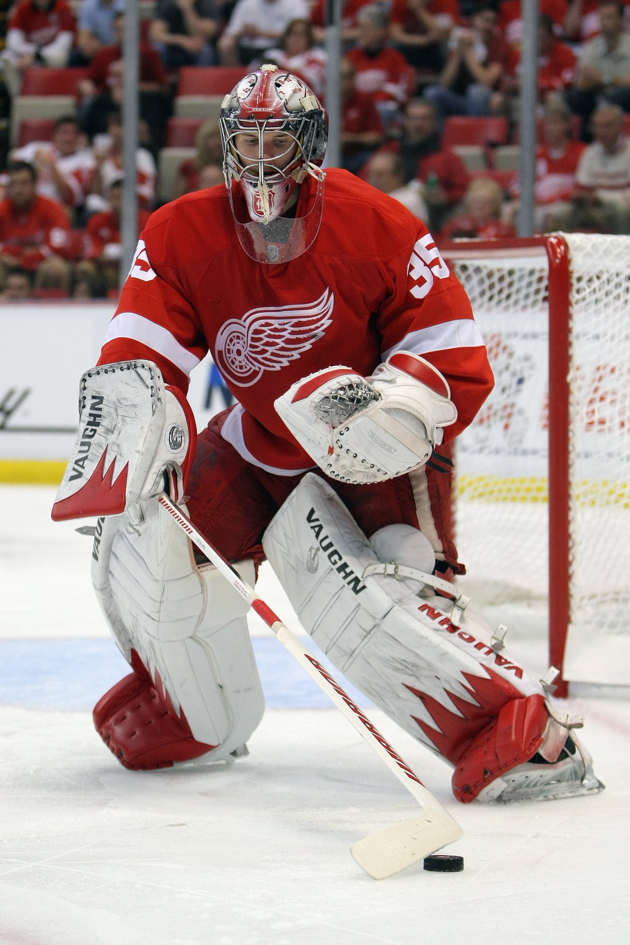 DETROIT - MAY 4:  Jimmy Howard #35 of the Detroit Red Wings defends the net against the San Jose Sharks in Game Three of the Western Conference Semifinals during the 2010 Stanley Cup Playoffs at Joe Louis Arena on May 4, 2010 in Detroit, Michigan. (Photo
