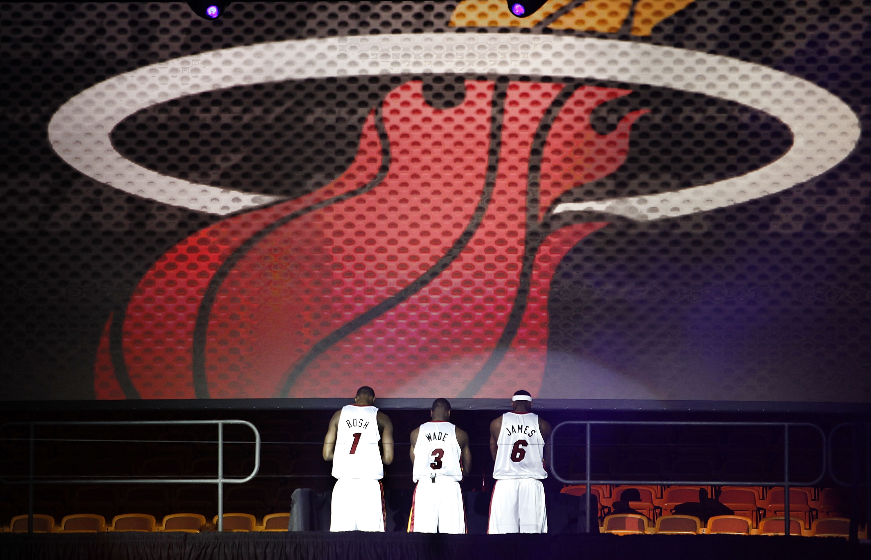 MIAMI - JULY 09:  (L-R) Chris Bosh #1, Dwyane Wade #3, and LeBron James #6 of the Miami Heat are introduced during a welcome party at American Airlines Arena on July 9, 2010 in Miami, Florida.  (Photo by Marc Serota/Getty Images)