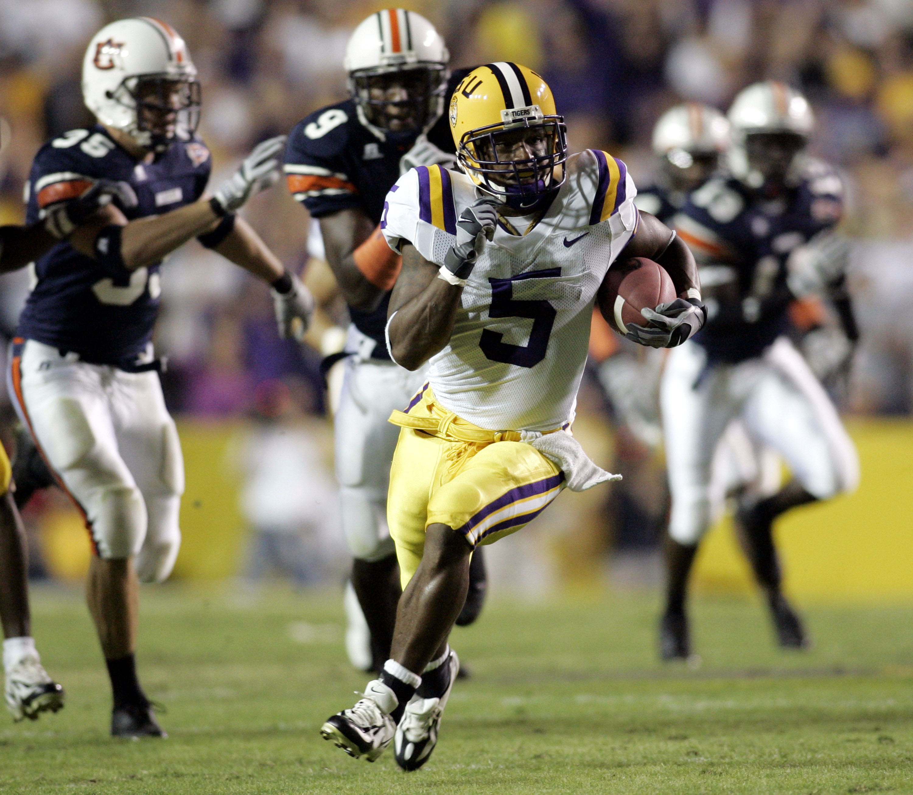 BATON ROUGE, LA - OCTOBER 22: Skyler Green #5 of Louisiana State University runs past the Auburn University defense to score a 65-yard touchdown on a punt return on October 22, 2005 at Tiger Stadium in Baton Rouge, Louisiana. (Photo by Chris Graythen/