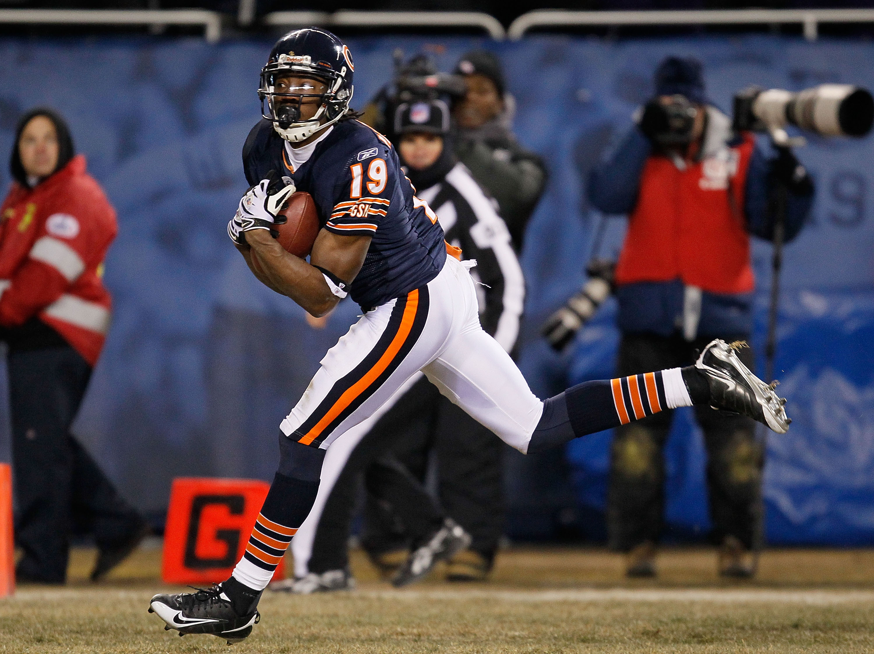 CHICAGO - DECEMBER 28: Devin Aromashodu #19 of the Chicago Bears catches the game-winning touchdown pass against the Minnesota Vikings at Soldier Field on December 28, 2009 in Chicago, Illinois. The Bears defeated the Vikings 36-30 in overtime. (Photo by 