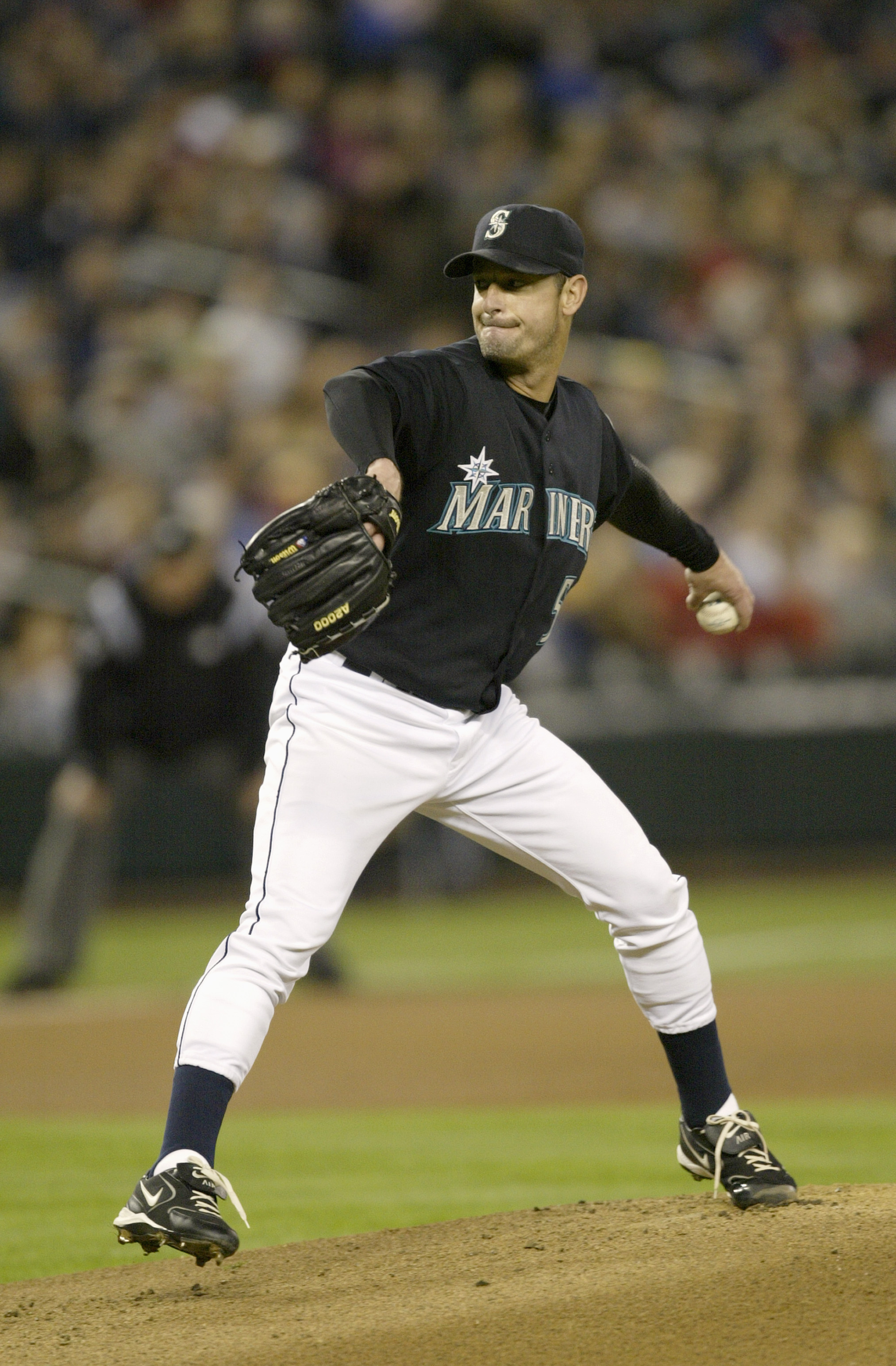 SEATTLE - SEPTEMBER 30:  Starting pitcher Jamie Moyer #50 of the Seattle Mariners winds back to pitch during a game against the Oakland Athletics on September 30 2005 at Safeco Field in Seattle Washington. The Mariners won 4-1. (Photo by Otto Greule Jr/Ge