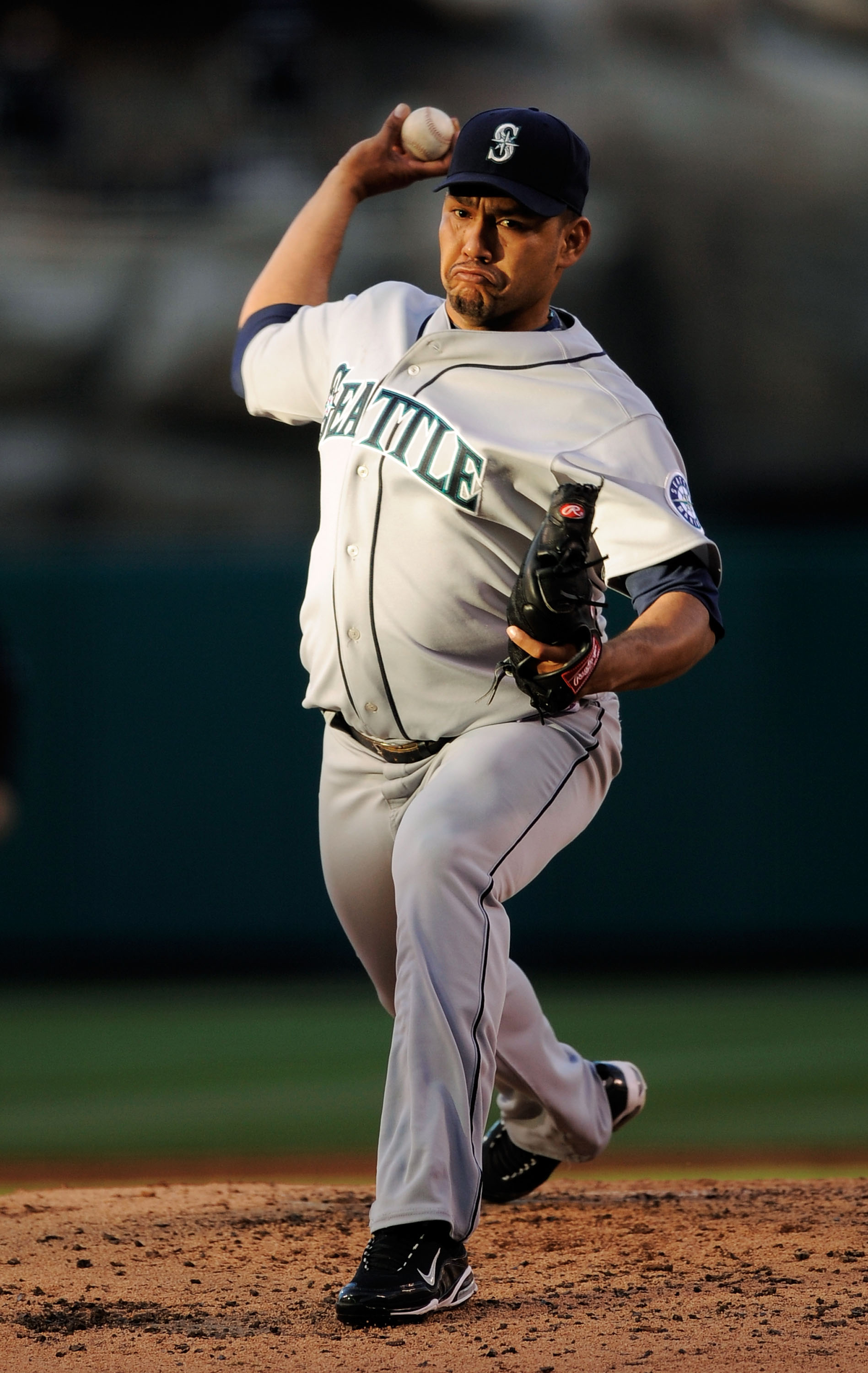 ANAHEIM, CA - APRIL 25: Pitcher Carlos Silva #52 of the Seattle Mariners throws against the Los Angeles Angels during the thrid inning of the baseball game on April 25, 2009 at Angel Stadium in Anaheim, California. (photo by kevork Djansezian/Getty Images