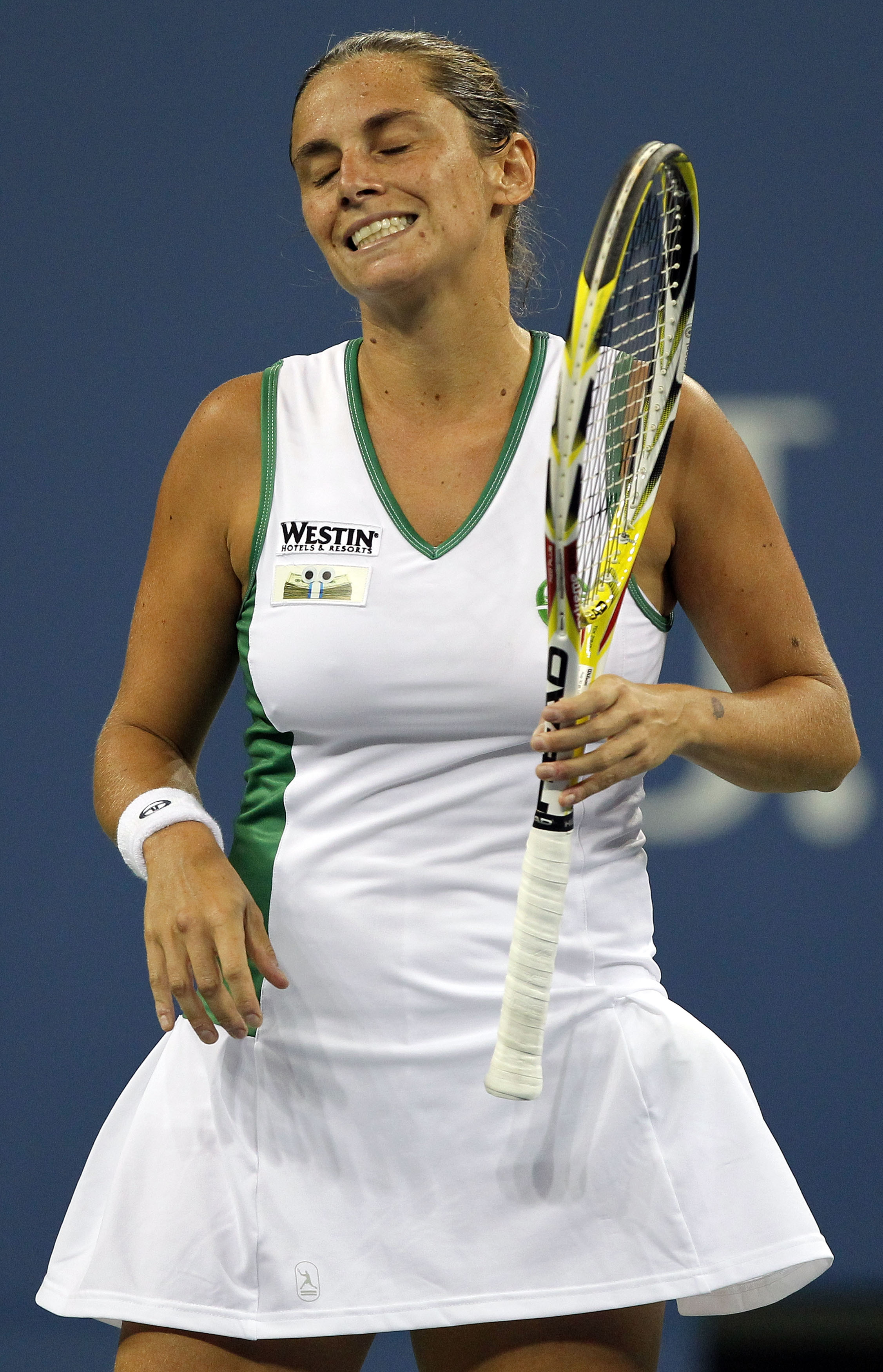 NEW YORK - AUGUST 30:  Roberta Vinci of Italy reacts after a point played against Venus Williams of the United States during the Women's Singles first round match on day one of the 2010 U.S. Open at the USTA Billie Jean King National Tennis Center on Augu